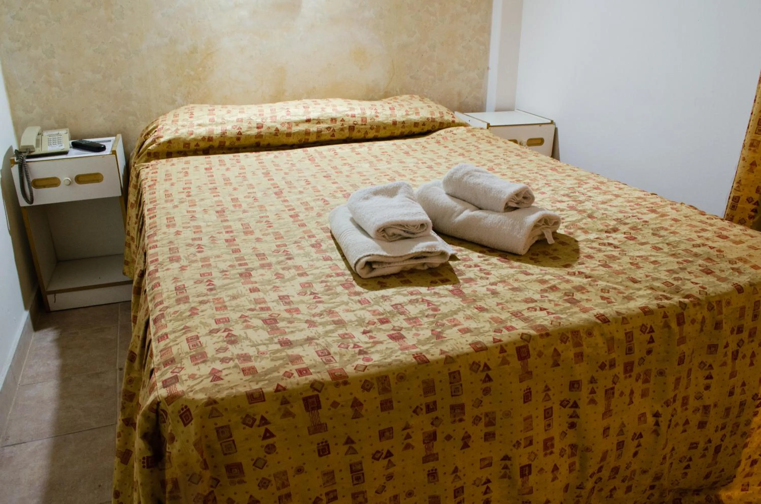 Bed in San Remo Grand Hotel