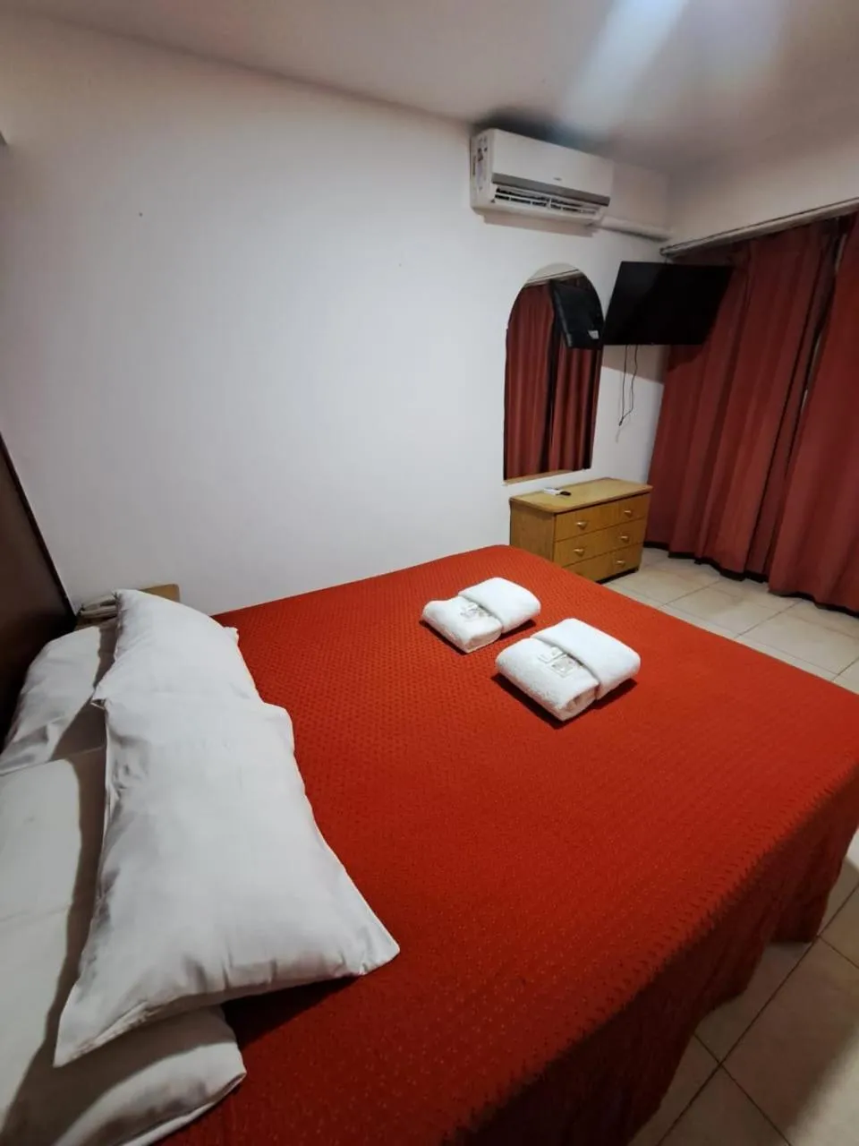 Bed in San Remo Grand Hotel