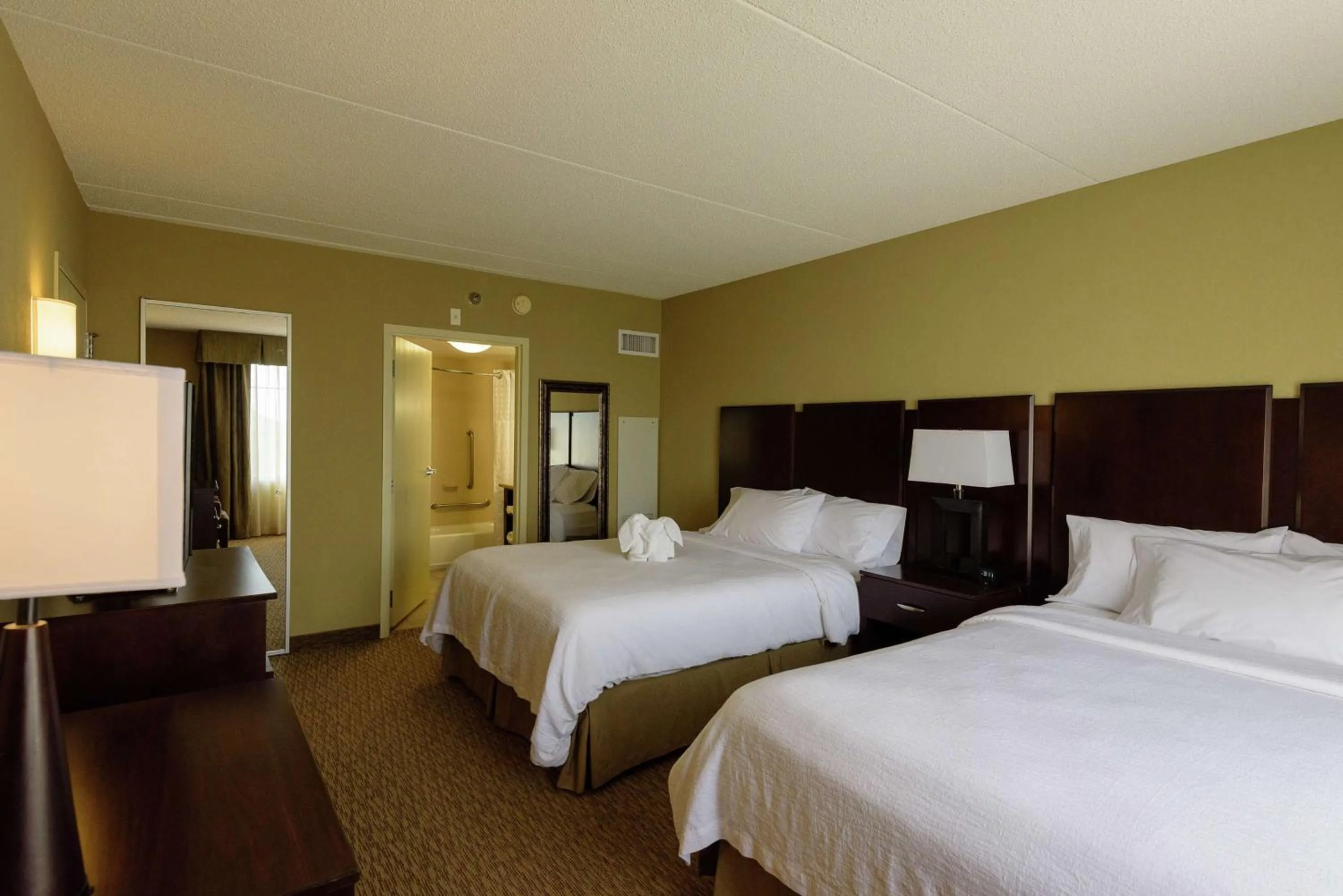 Bed in Embassy Suites by Hilton Minneapolis North