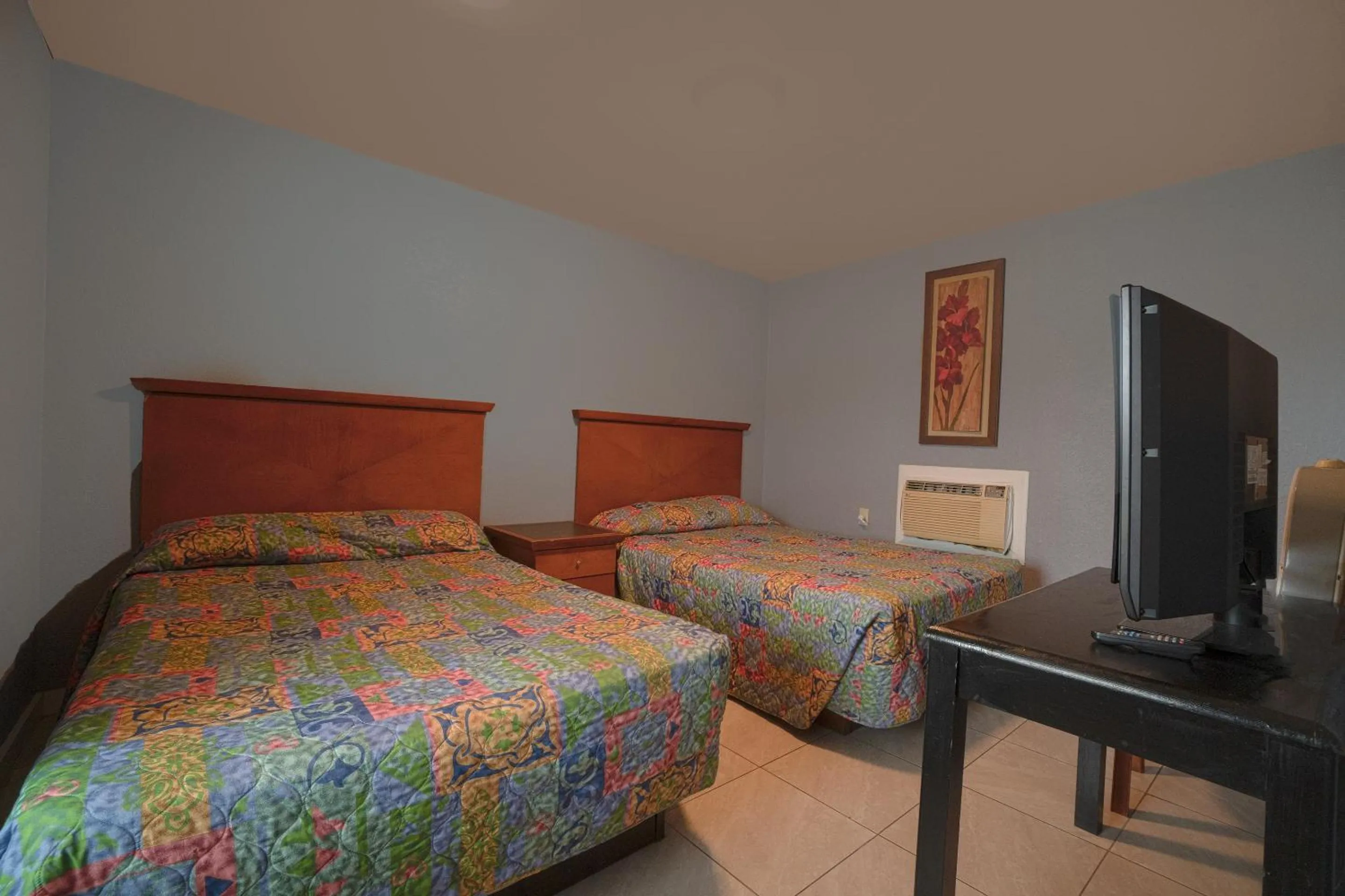 Bedroom, Bed in Texana Inn Edna By OYO