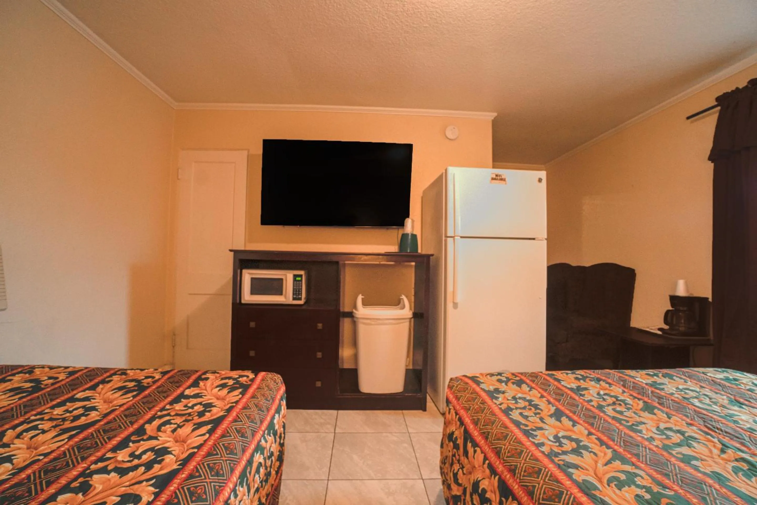 Bedroom, Bed in Texana Inn Edna By OYO