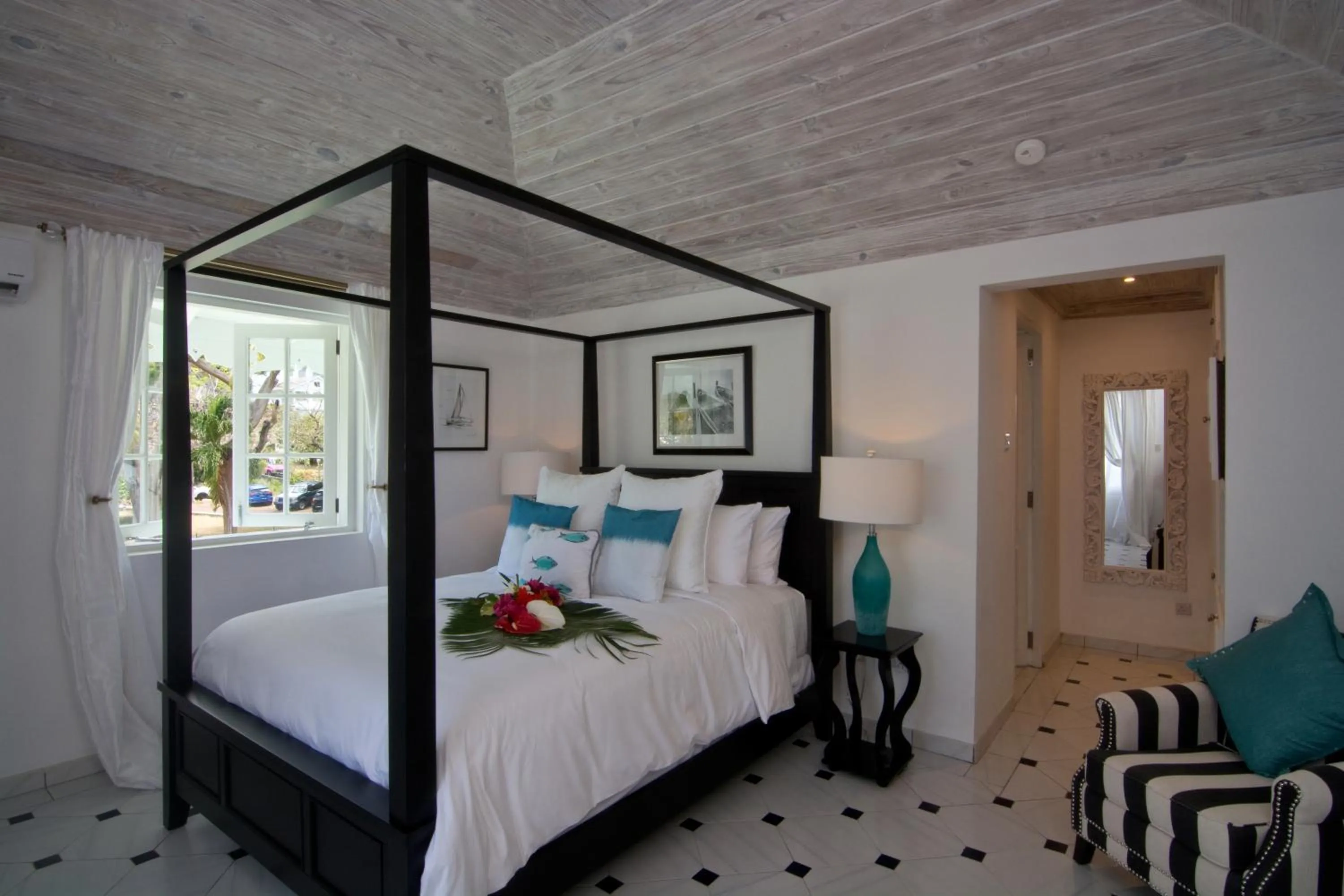 Photo of the whole room, Bed in Bequia Plantation Hotel