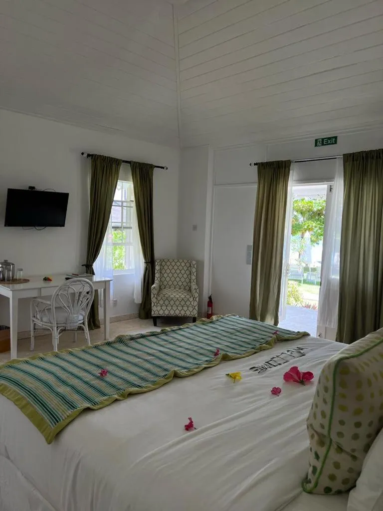 Bed in Bequia Plantation Hotel