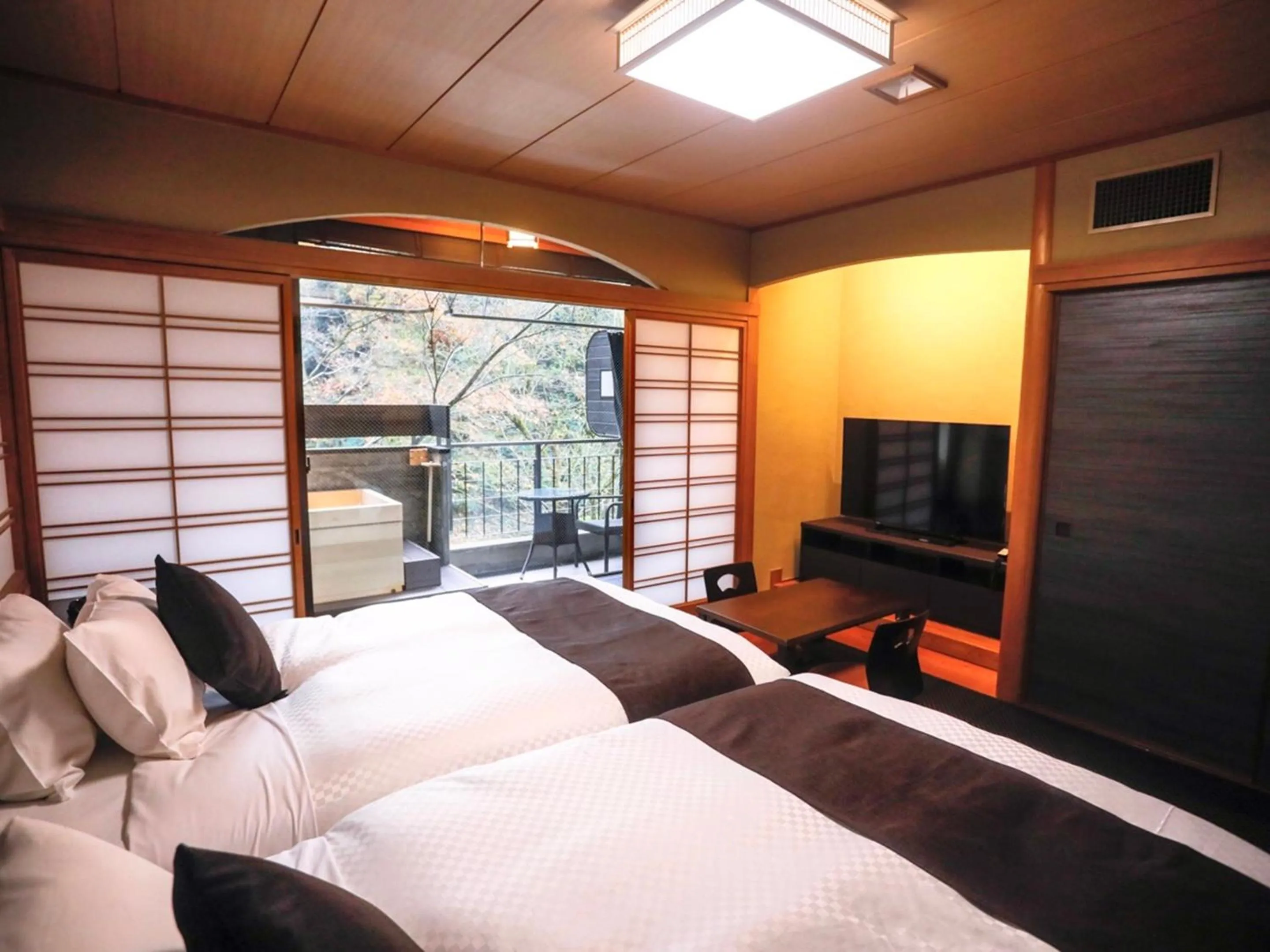 Photo of the whole room, Bed in LiVEMAX RESORT Okudogo