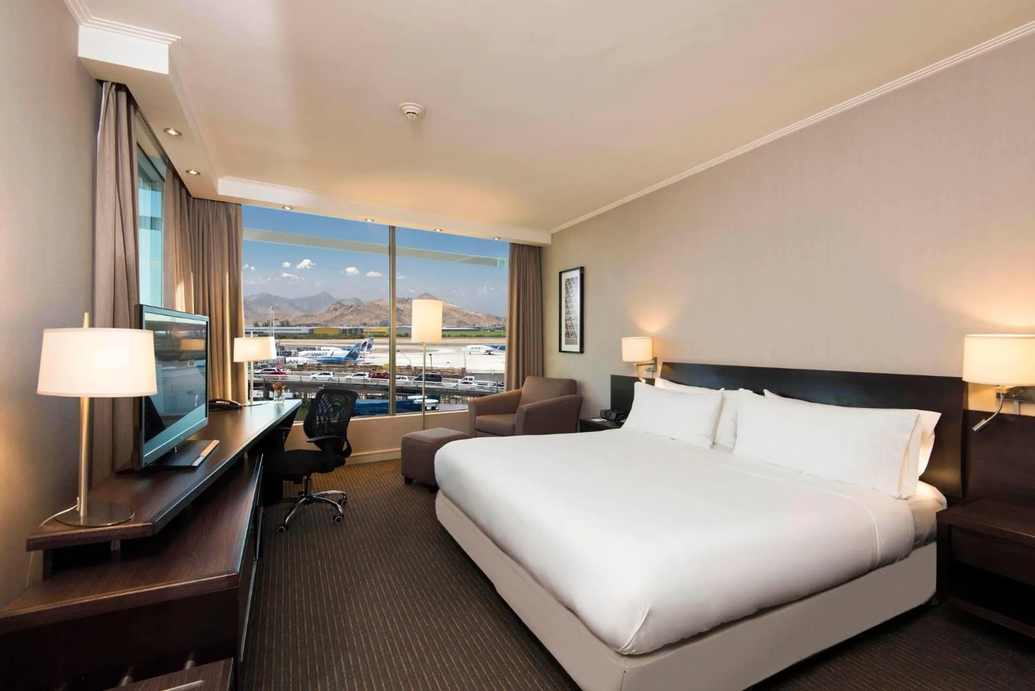 Photo of the whole room, Bed in Holiday Inn Santiago - Airport Terminal by IHG