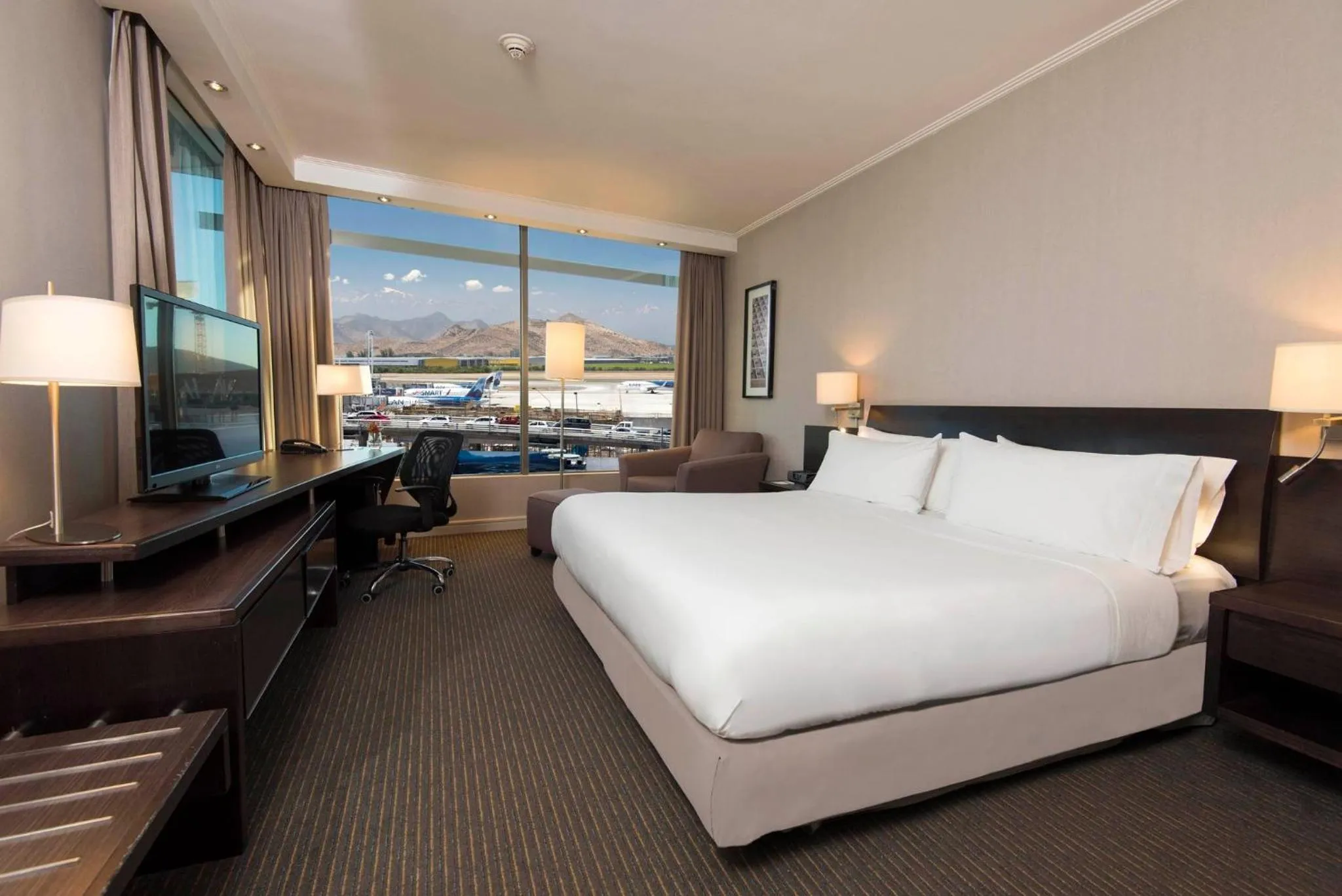 Photo of the whole room, Bed in Holiday Inn Santiago - Airport Terminal by IHG