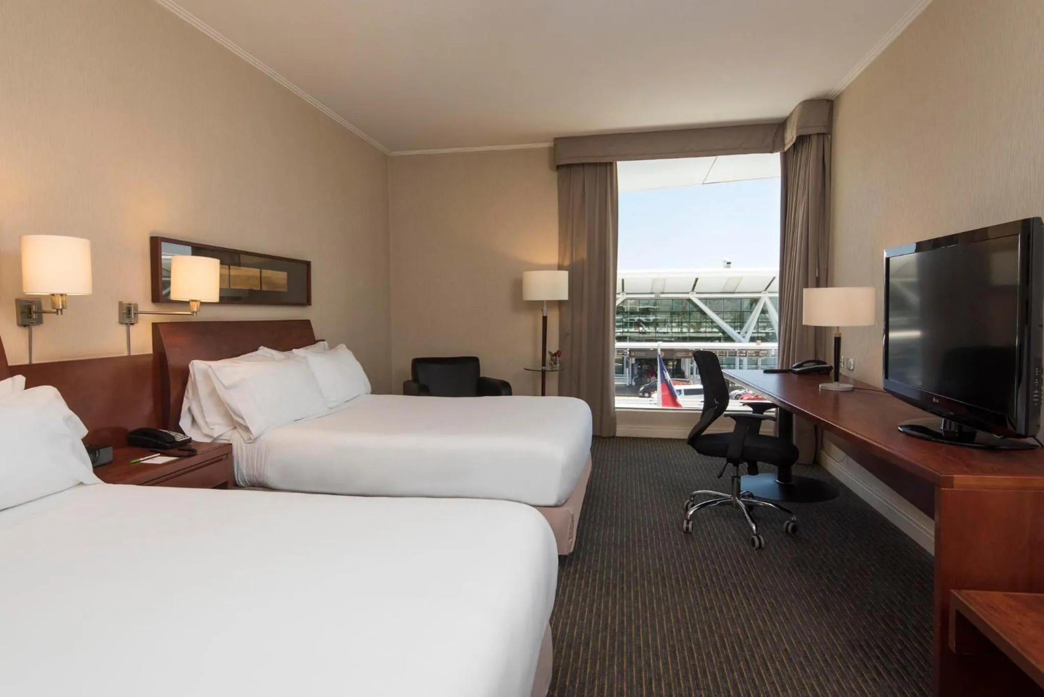 Photo of the whole room, Bed in Holiday Inn Santiago - Airport Terminal by IHG