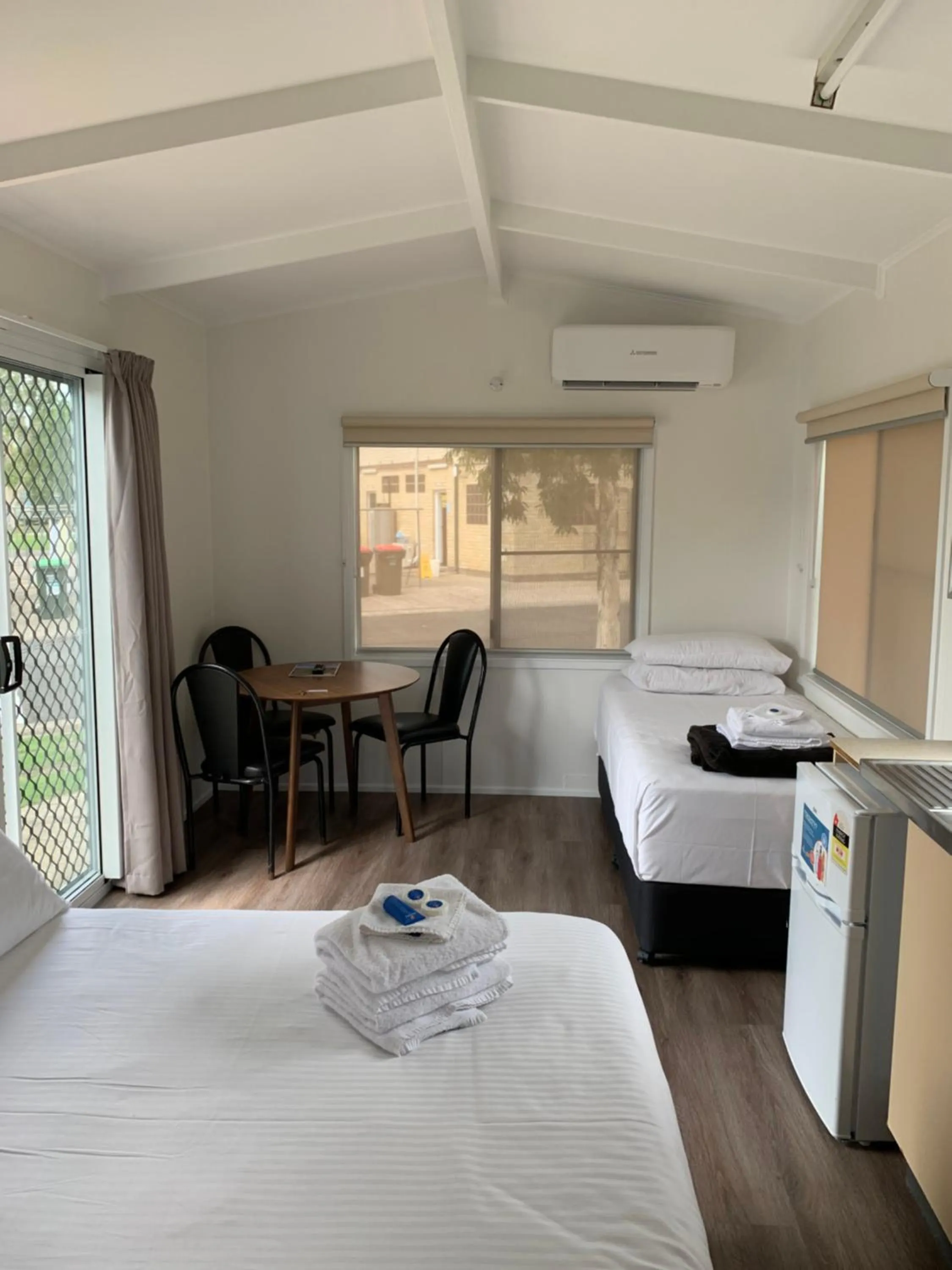 Living room, Bed in Discovery Parks - Casino