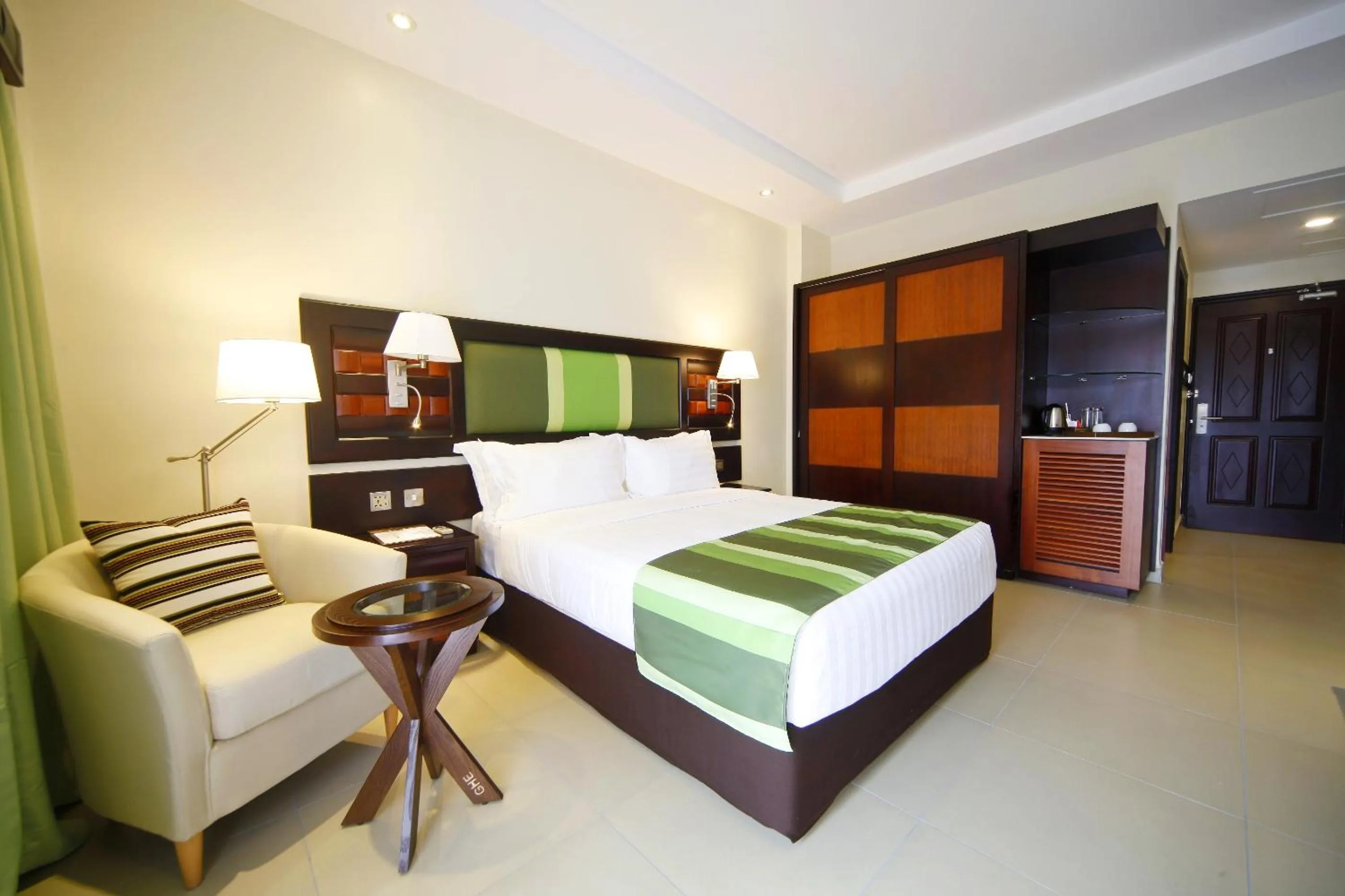 Photo of the whole room, Bed in Best Western Premier Garden Hotel Entebbe