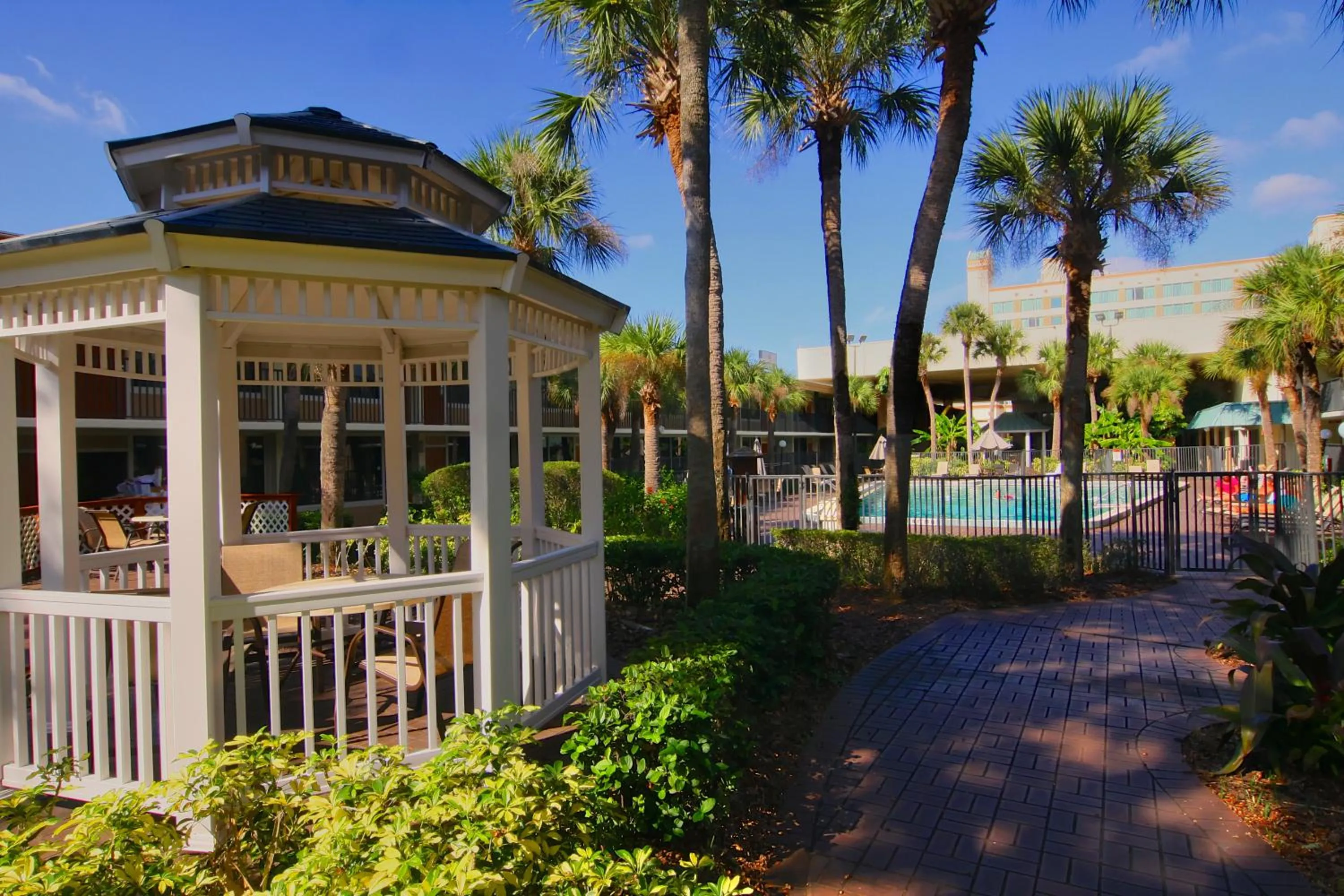 Property building in Ramada by Wyndham Kissimmee Gateway - Free Theme Park Shuttle