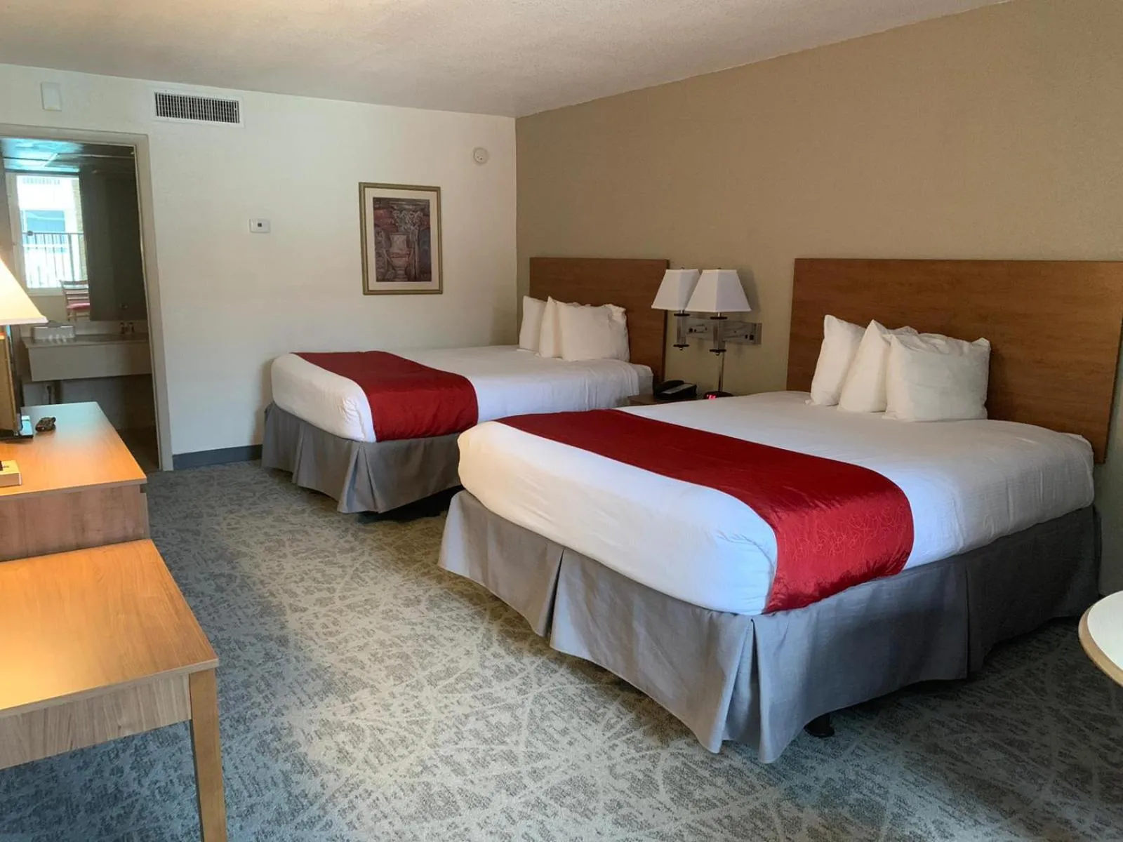 Bed in Ramada by Wyndham Kissimmee Gateway - Free Theme Park Shuttle