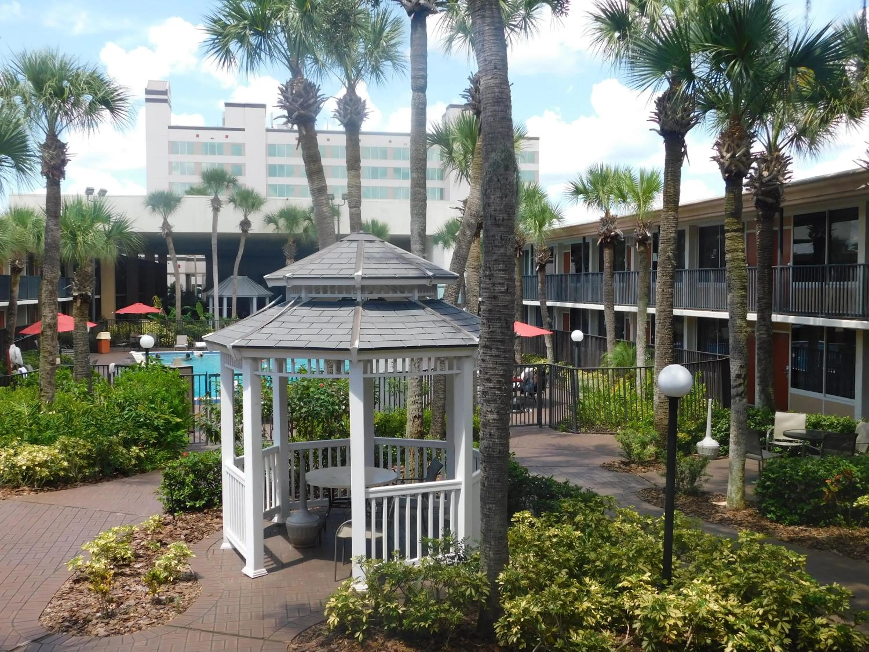 Patio in Ramada by Wyndham Kissimmee Gateway - Free Theme Park Shuttle