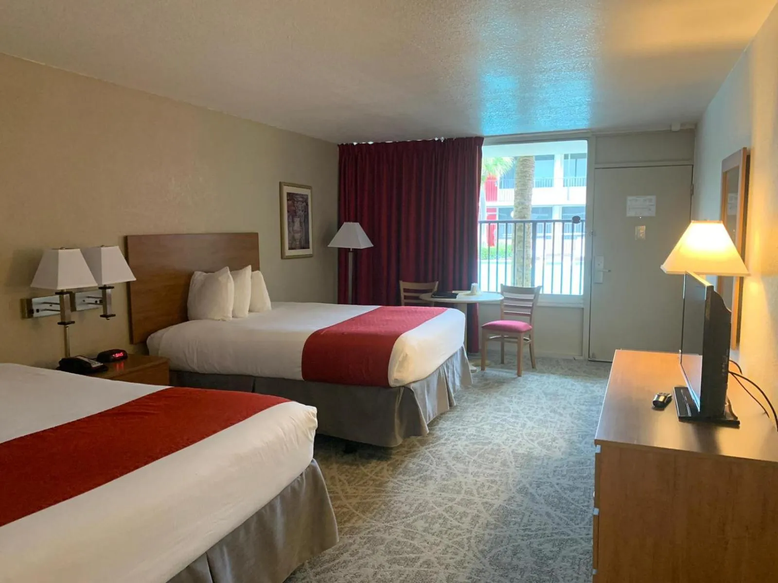 Bed in Ramada by Wyndham Kissimmee Gateway - Free Theme Park Shuttle