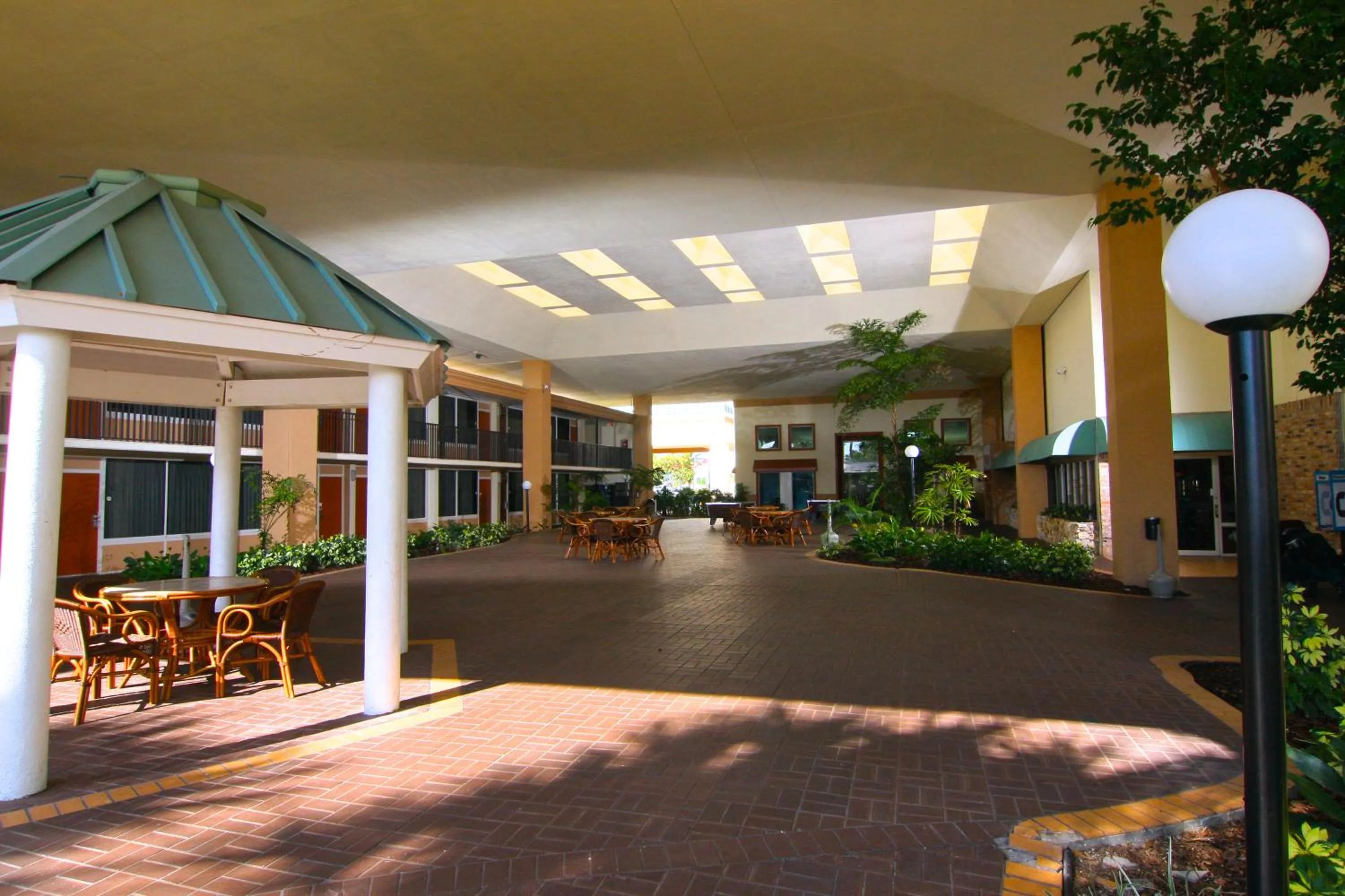 Patio in Ramada by Wyndham Kissimmee Gateway - Free Theme Park Shuttle
