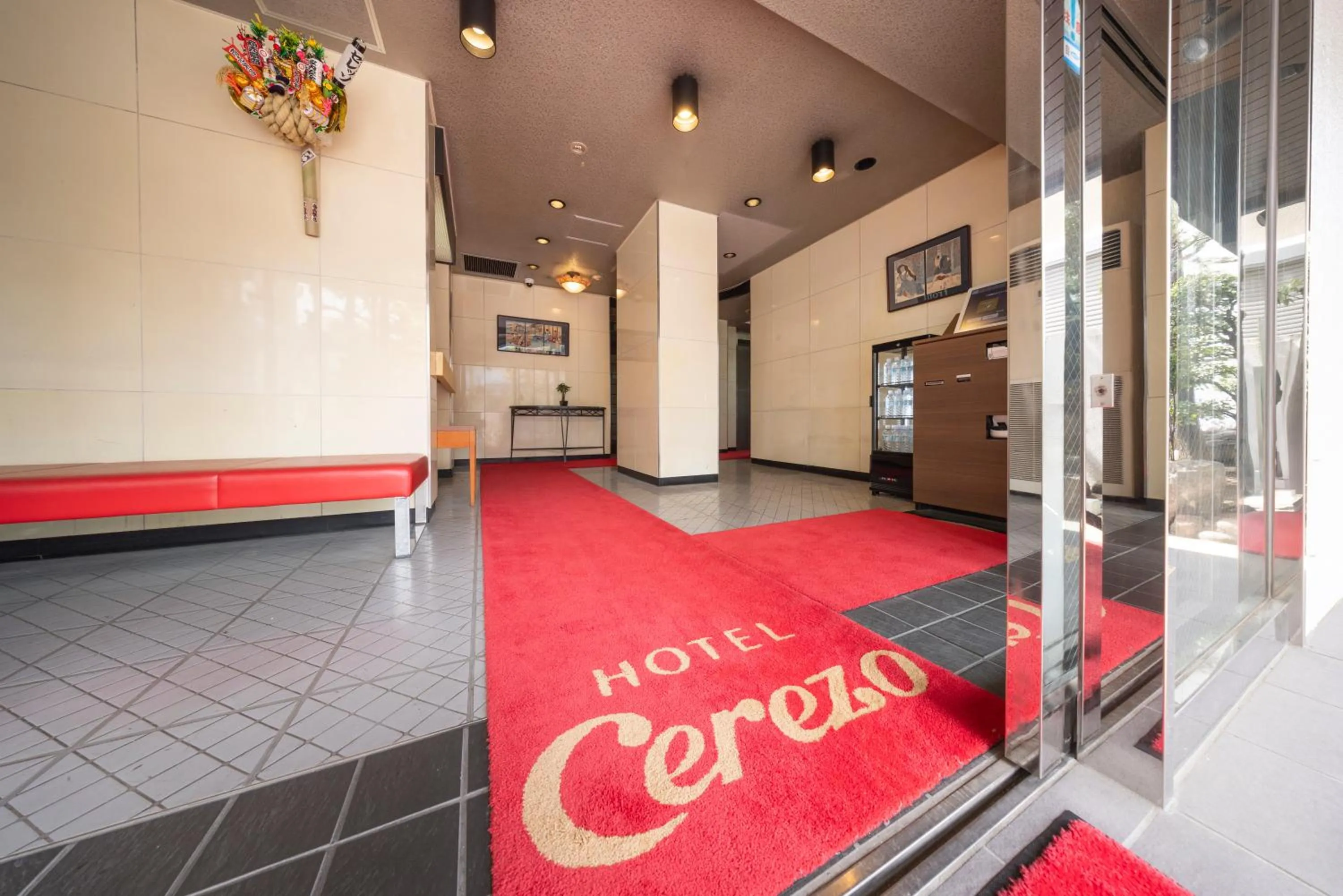 Property logo or sign in Hotel Cerezo