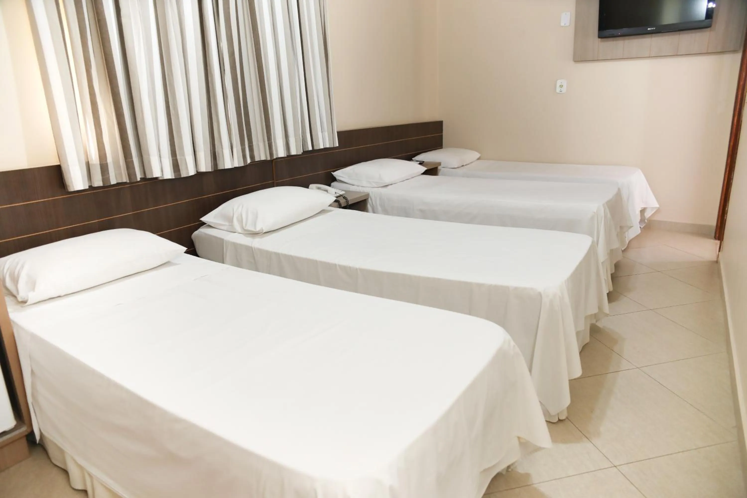 Bed in Hotel Villa Canoas