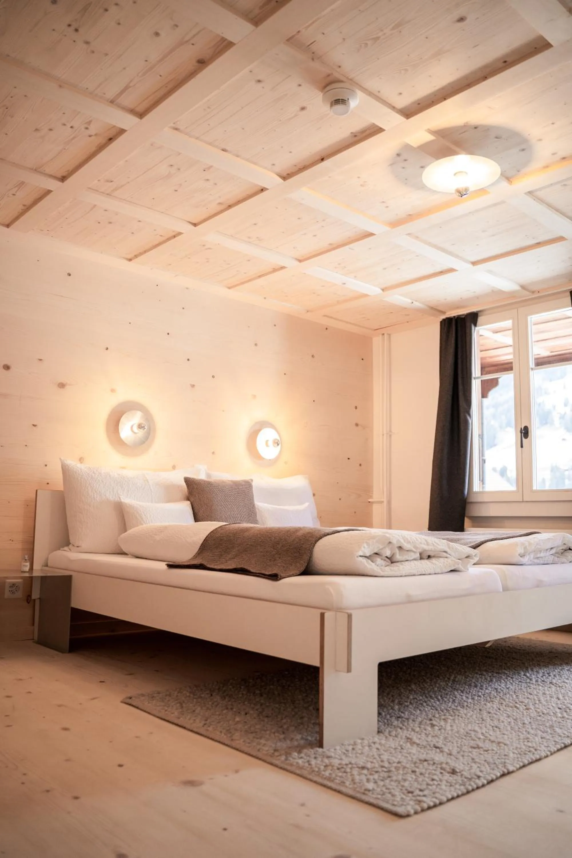 Bed in Lenk Lodge - Boutique & Design Hotel und Apartements