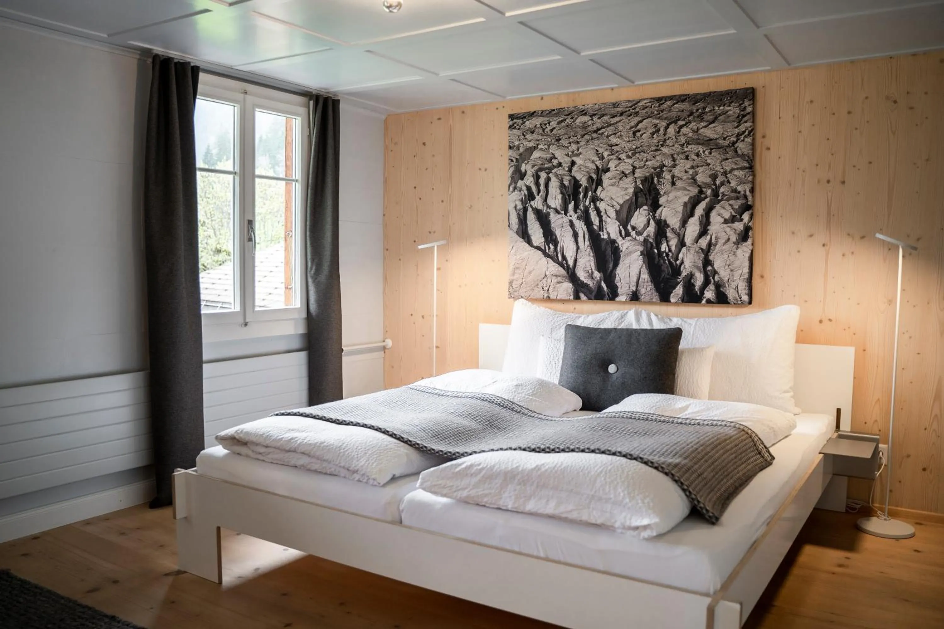 Bed in Lenk Lodge - Boutique & Design Hotel und Apartements