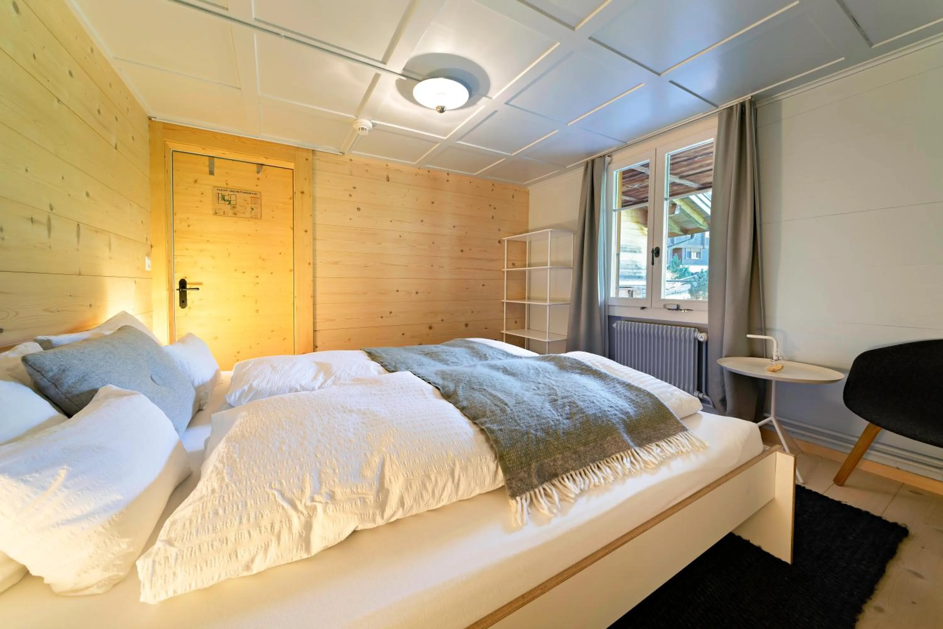 Bed in Lenk Lodge - Boutique & Design Hotel und Apartements