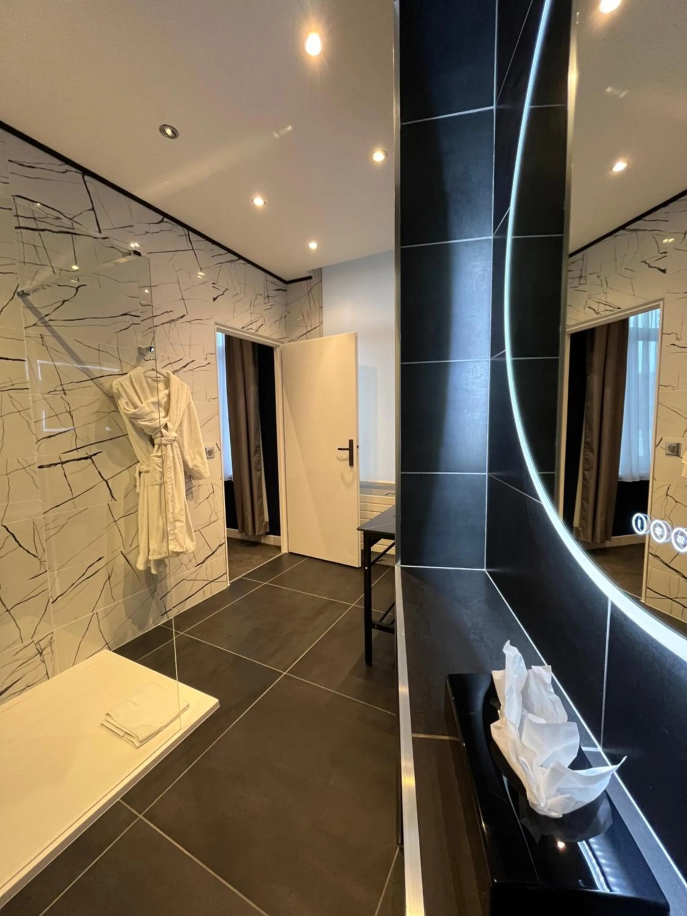 Shower in LOGIS Hôtel Borel