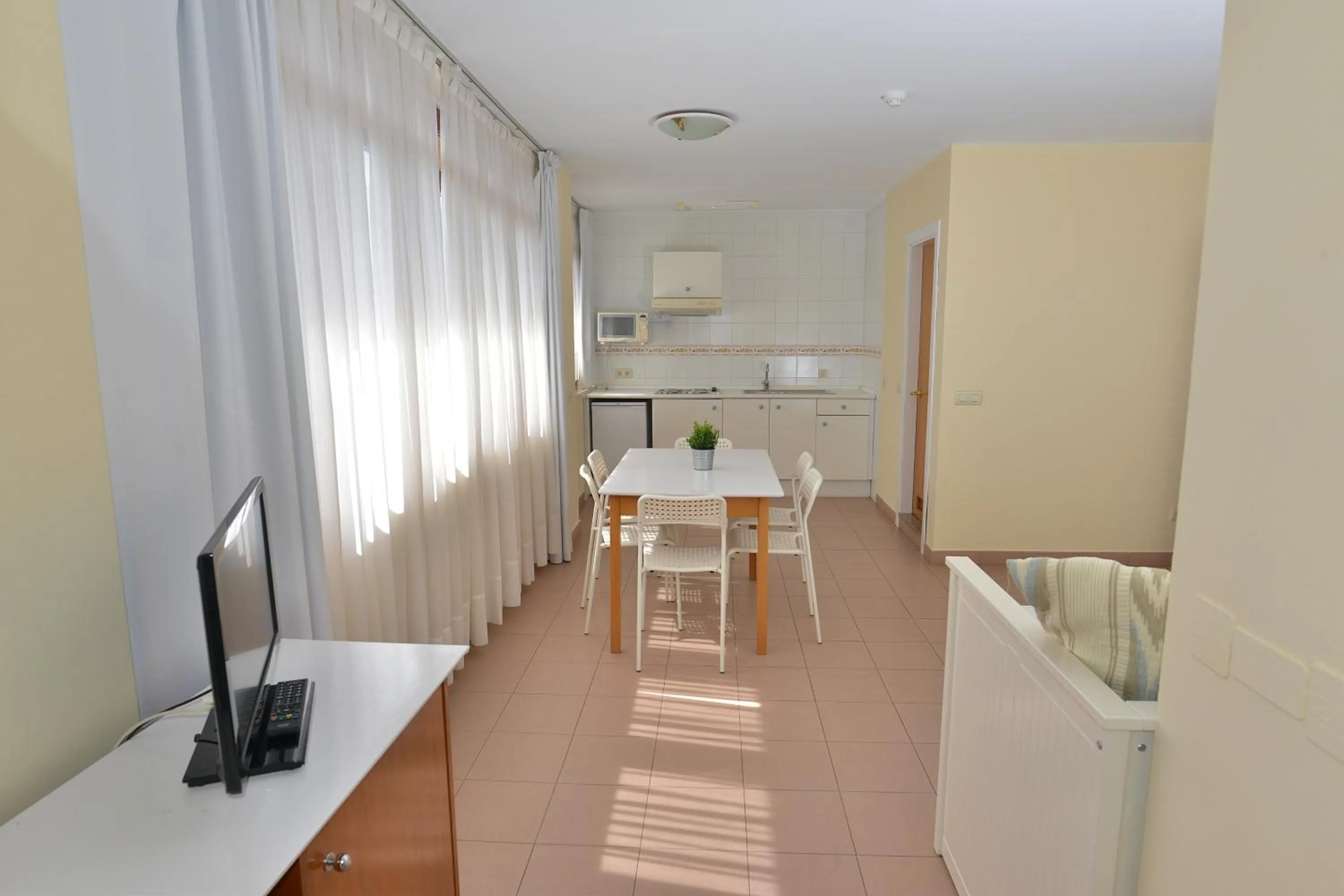 Dining area in Apartamentos Marina