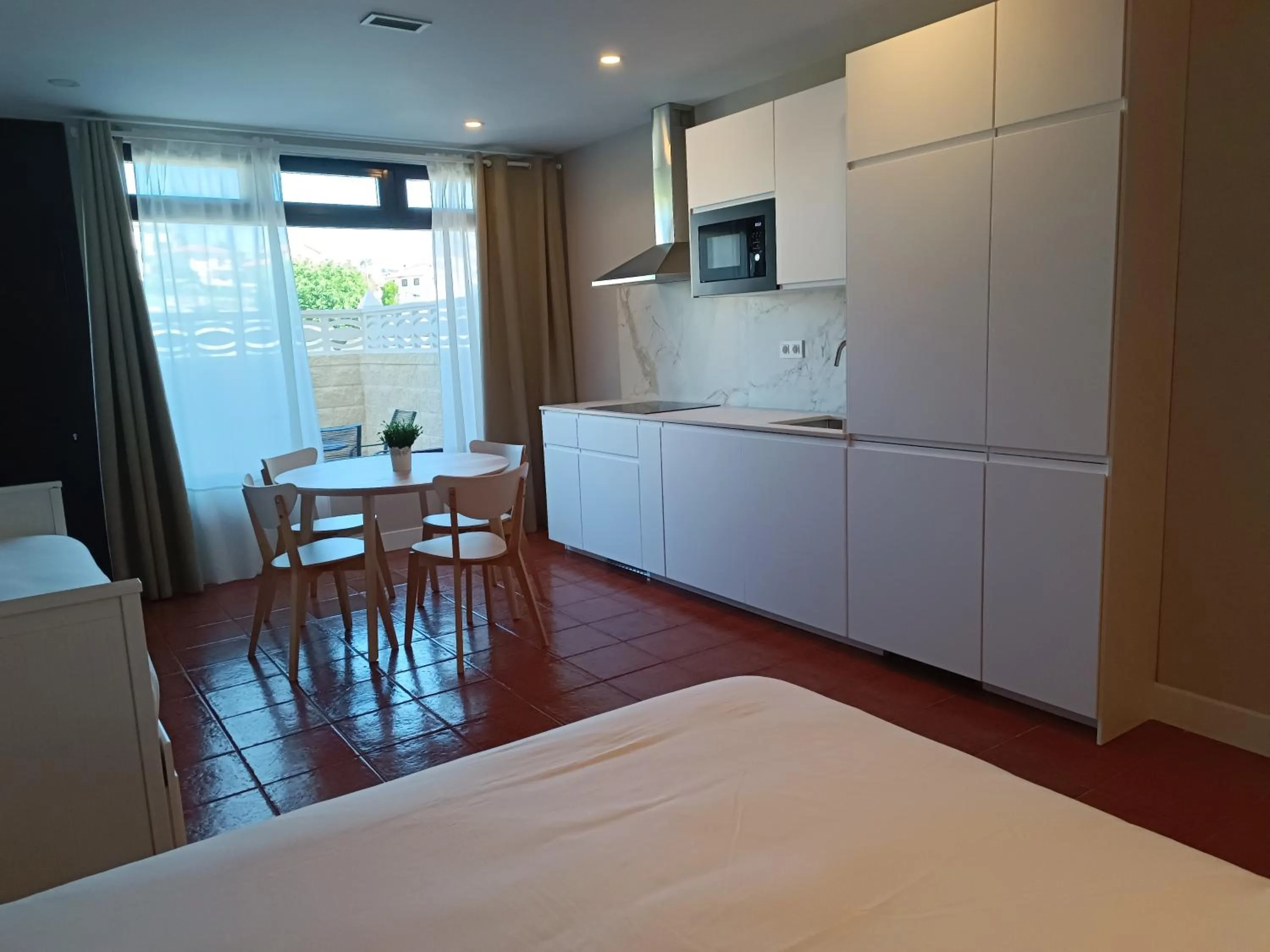 Kitchen or kitchenette in Apartamentos Marina