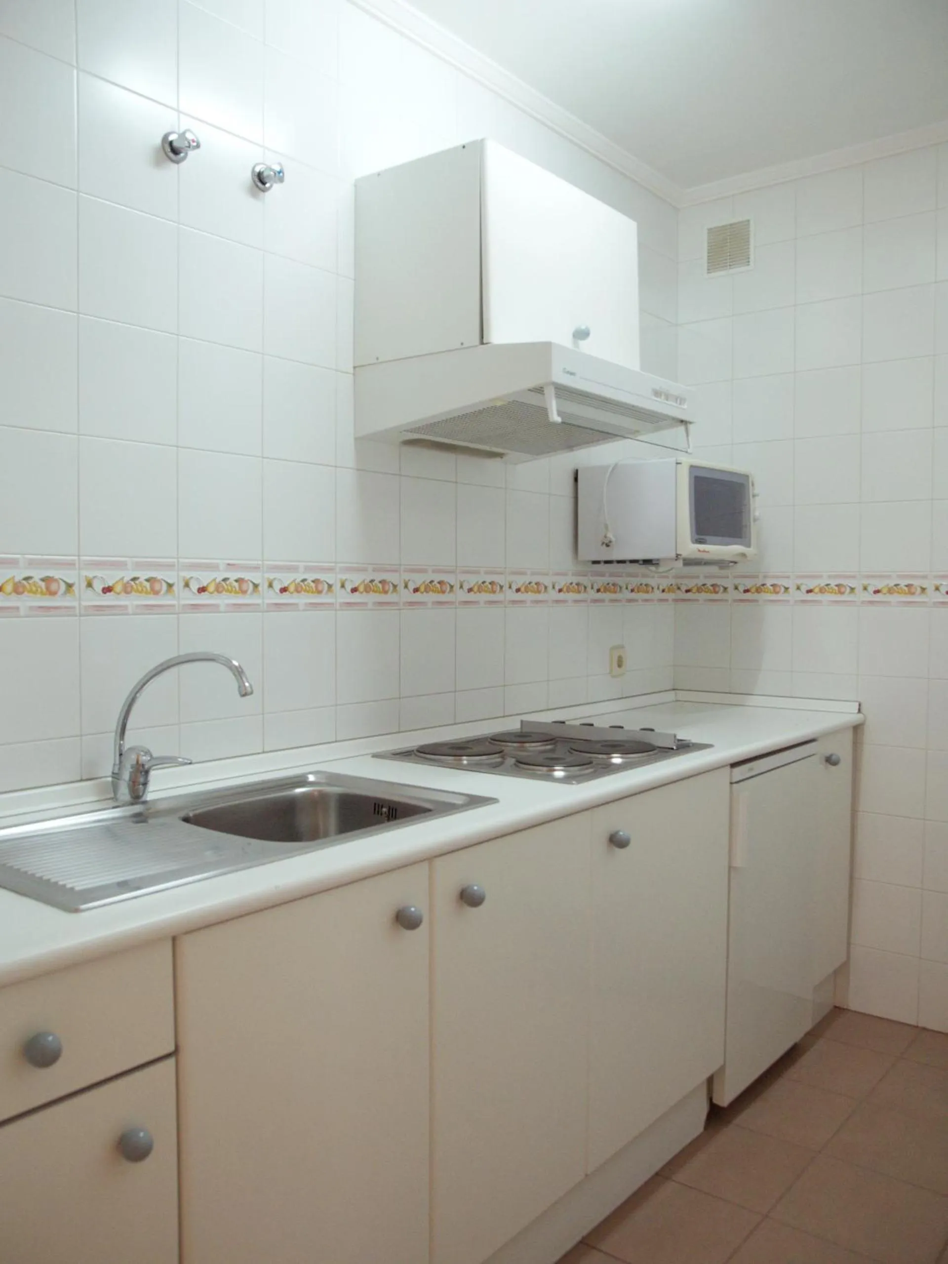 Kitchen or kitchenette in Apartamentos Marina