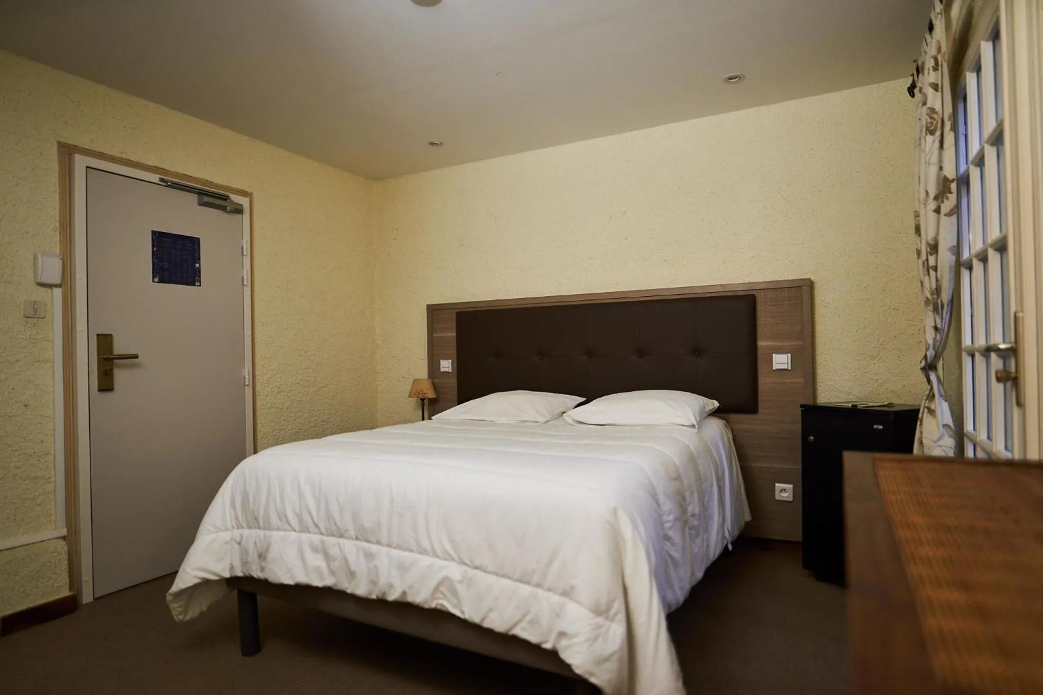 Bed in Hôtel La Flambée