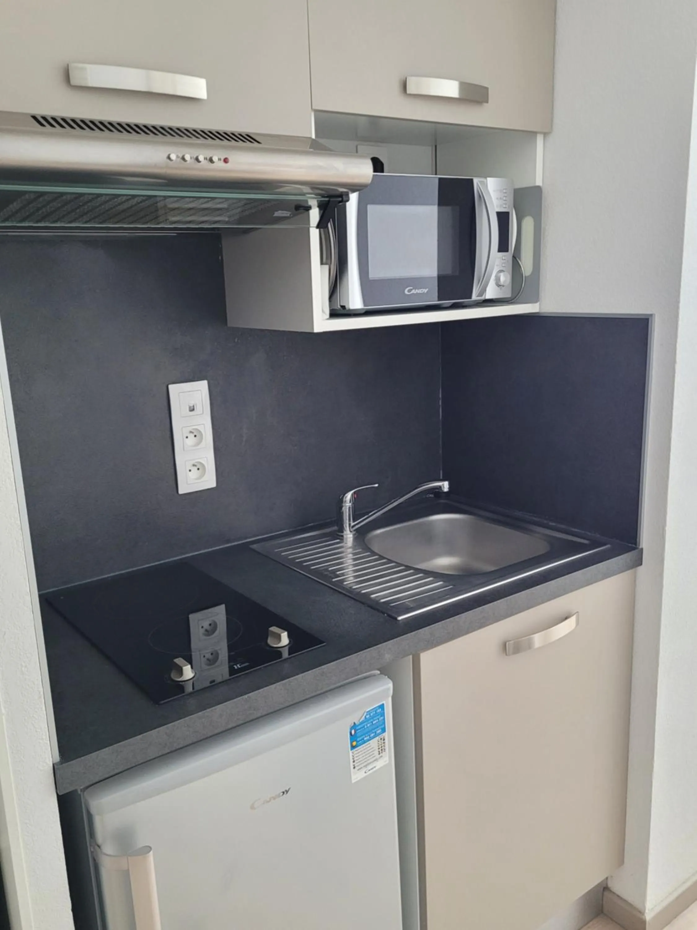 Kitchen or kitchenette in Résidence Odalys Front de Neige