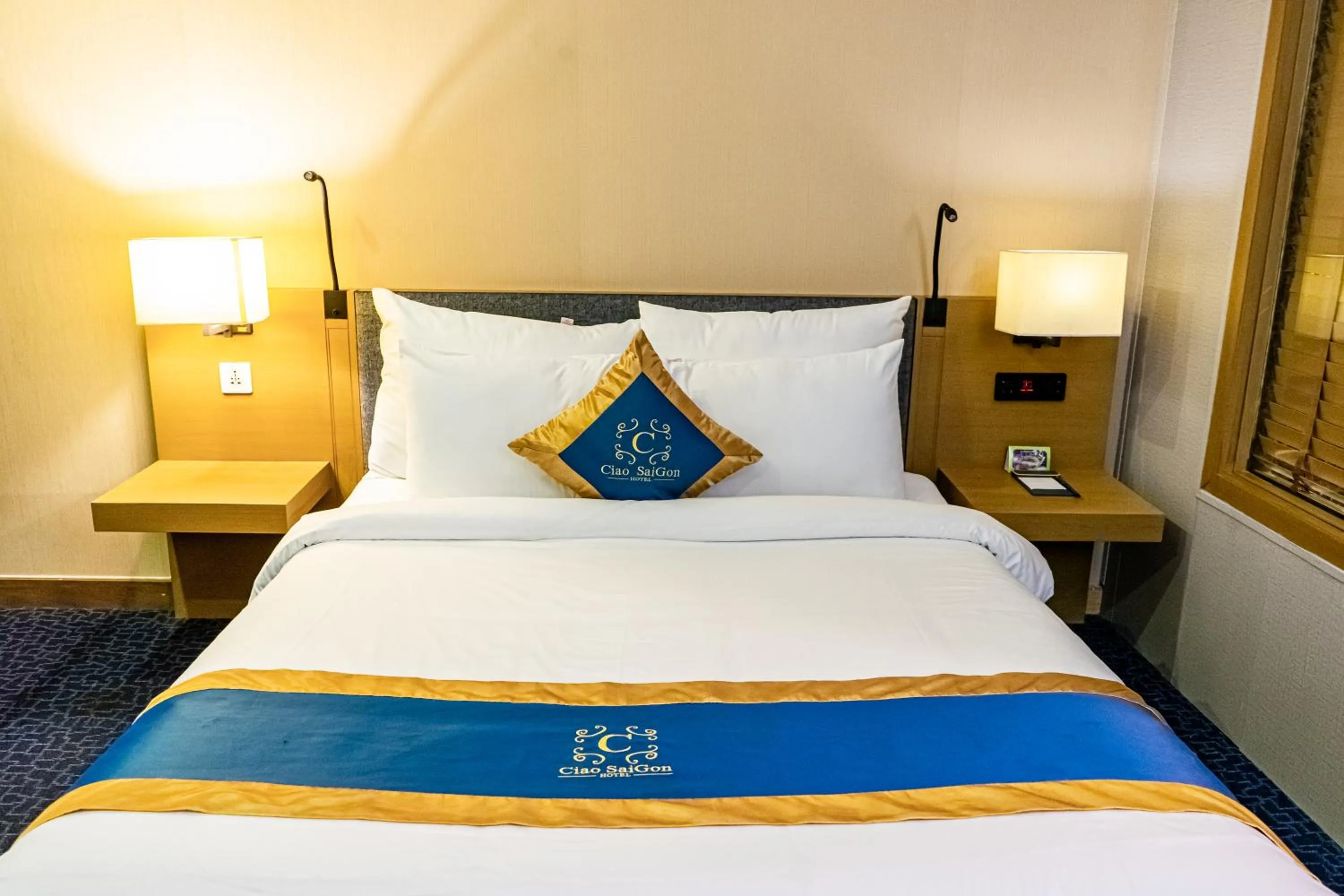 Bed in Ciao SaiGon Hotel & Spa