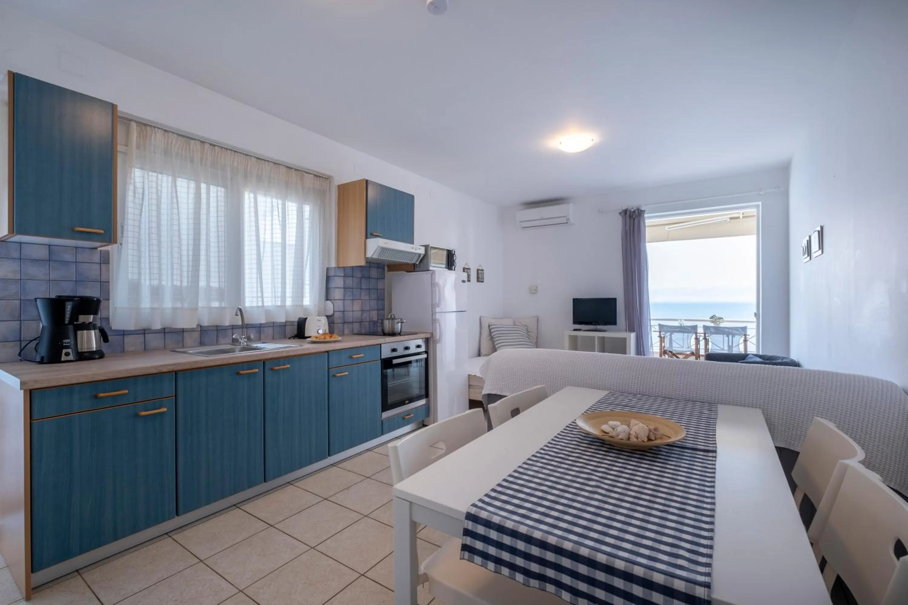 Kitchen or kitchenette in Meli Apartments & Villas