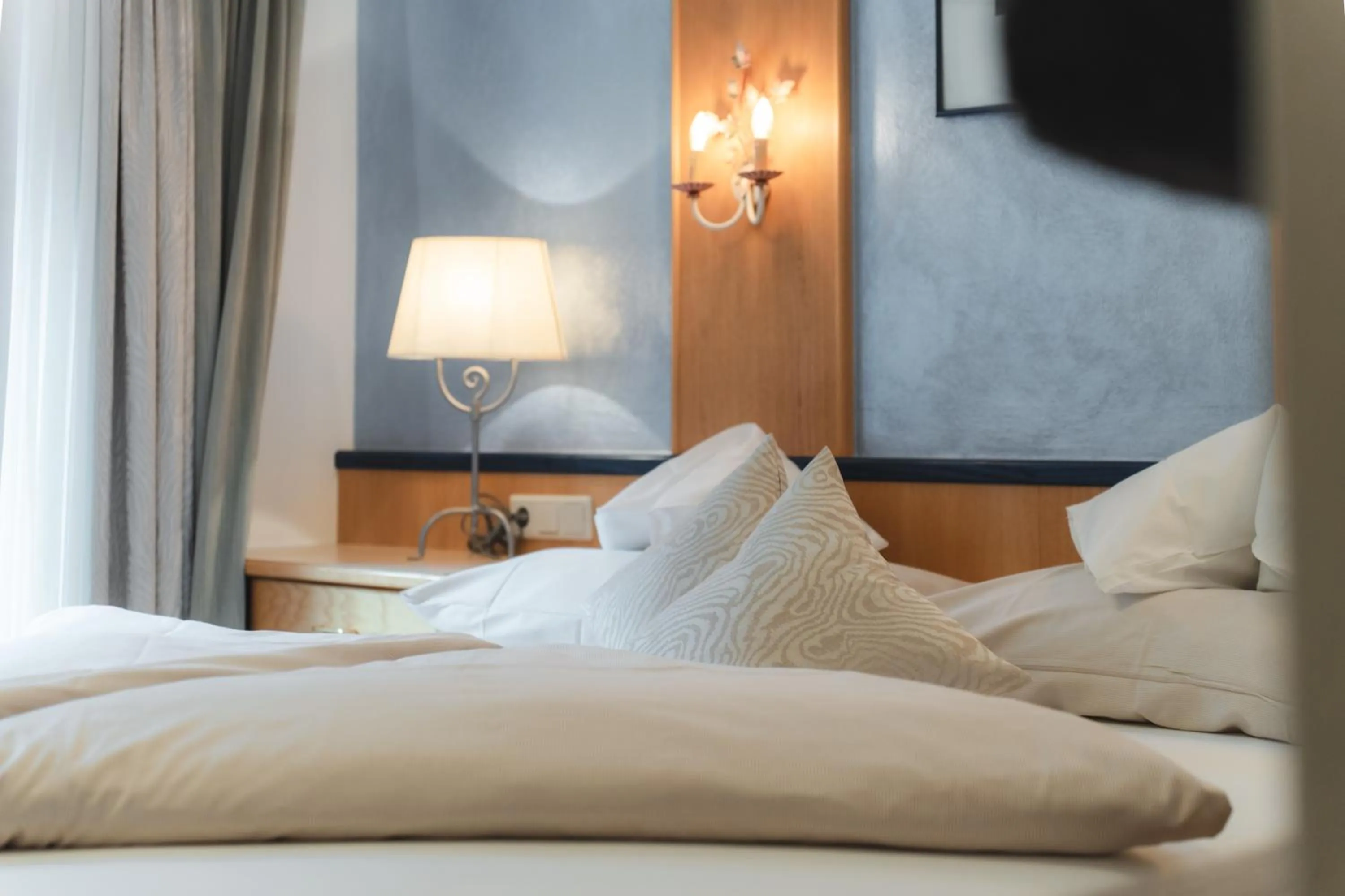 Bed in Alpinhotel Berghaus spa