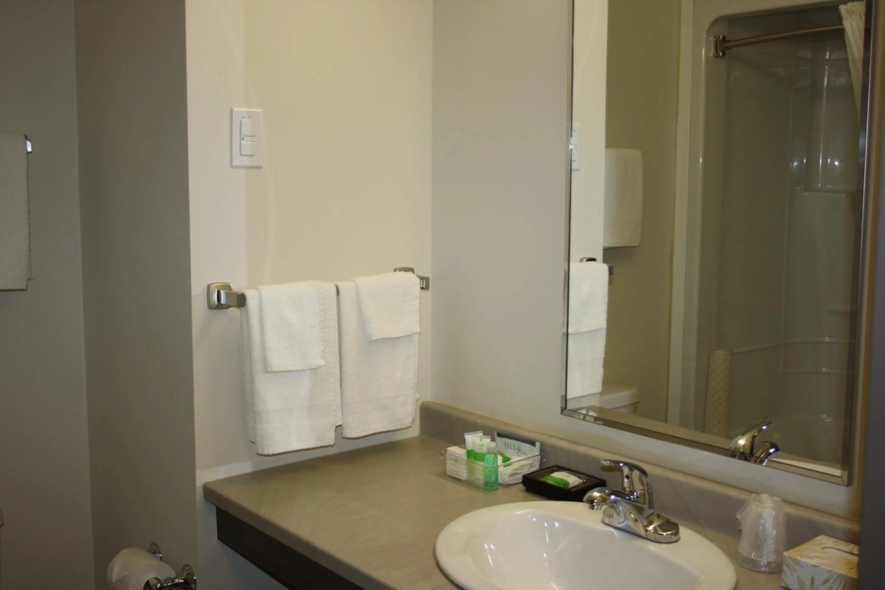 Bathroom in Crossroads Inn & Suites