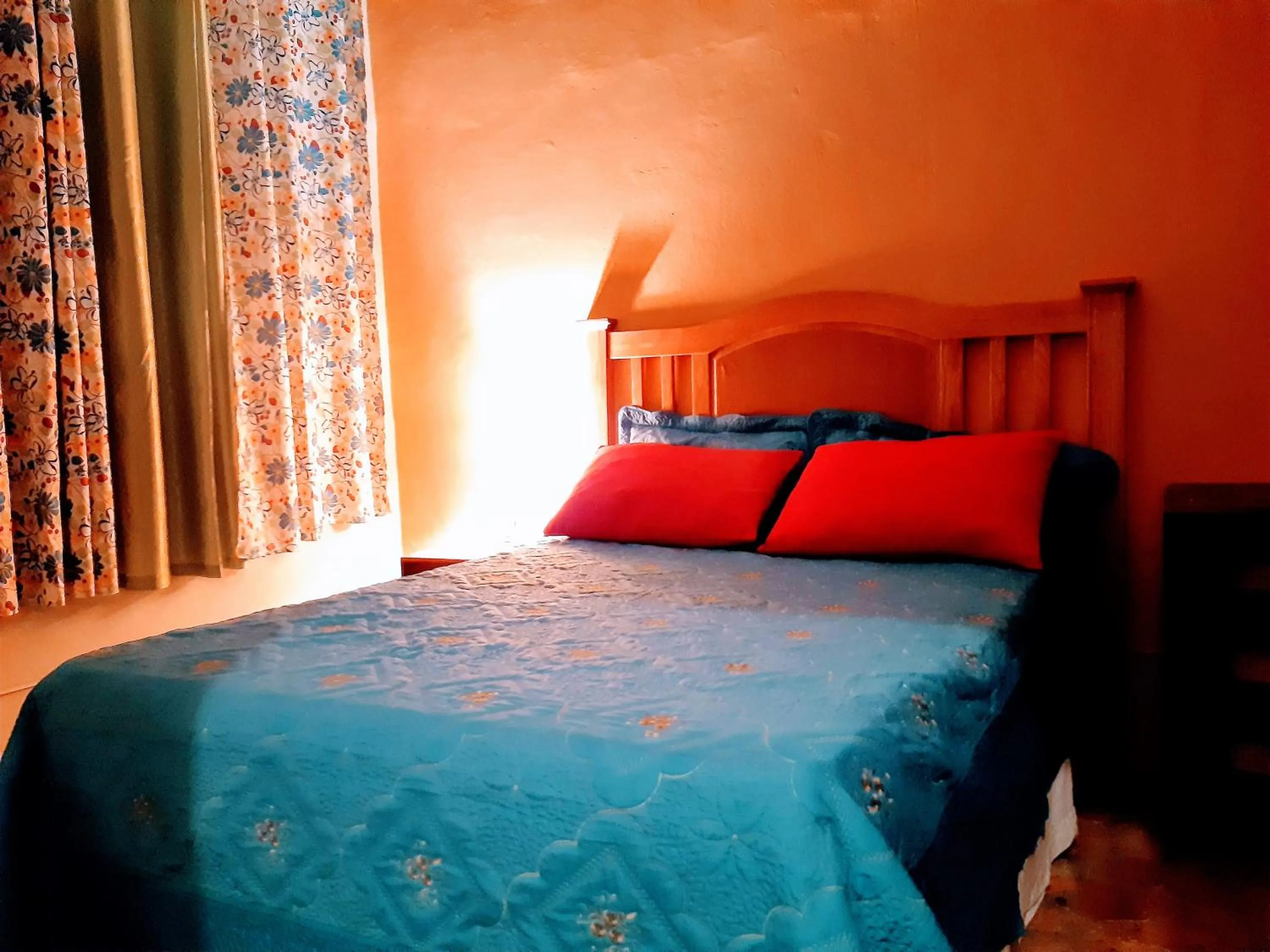 Bed in Hotel El Tronco Inc