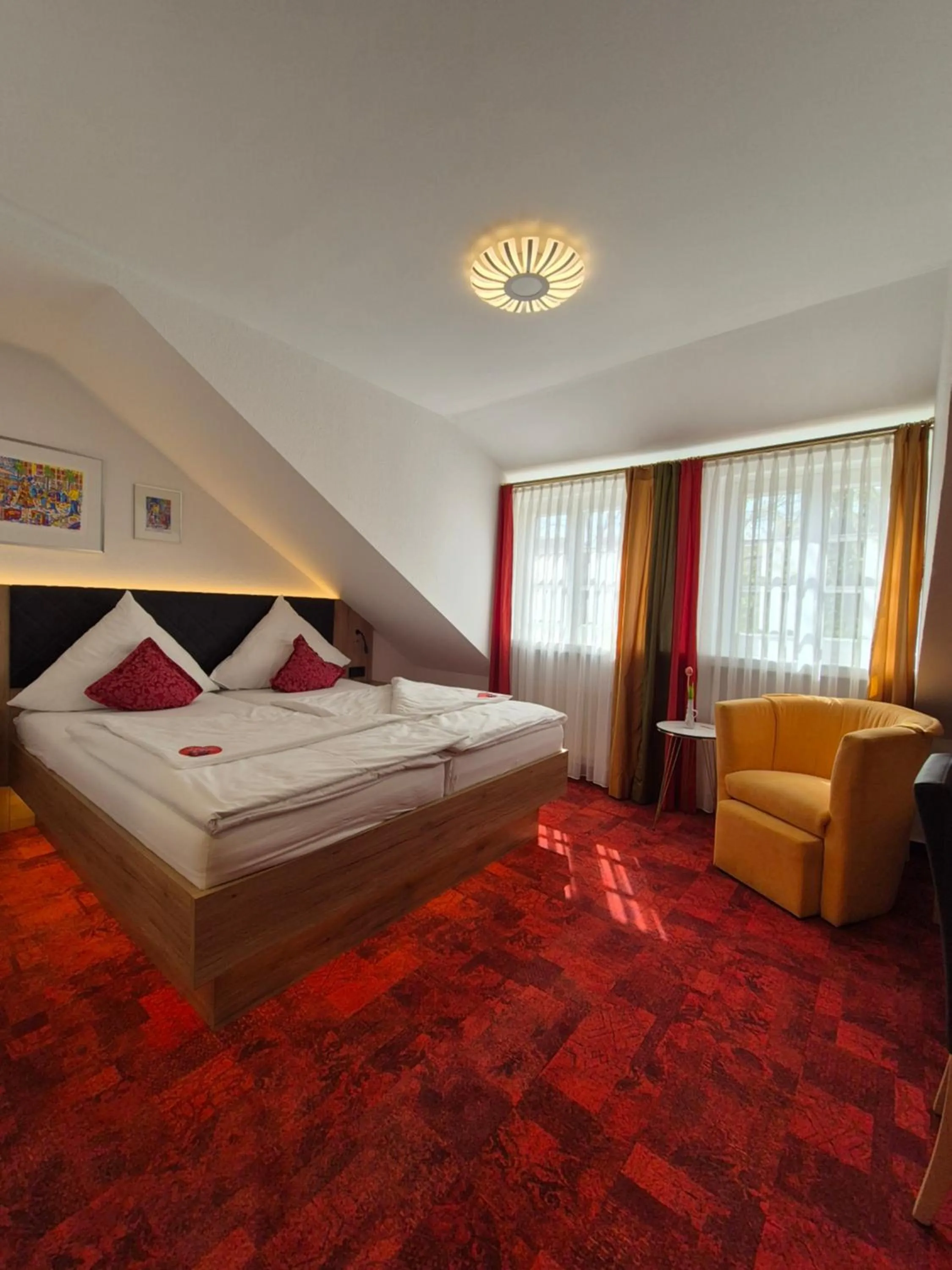 Bed in Hotel St. Georg Garni