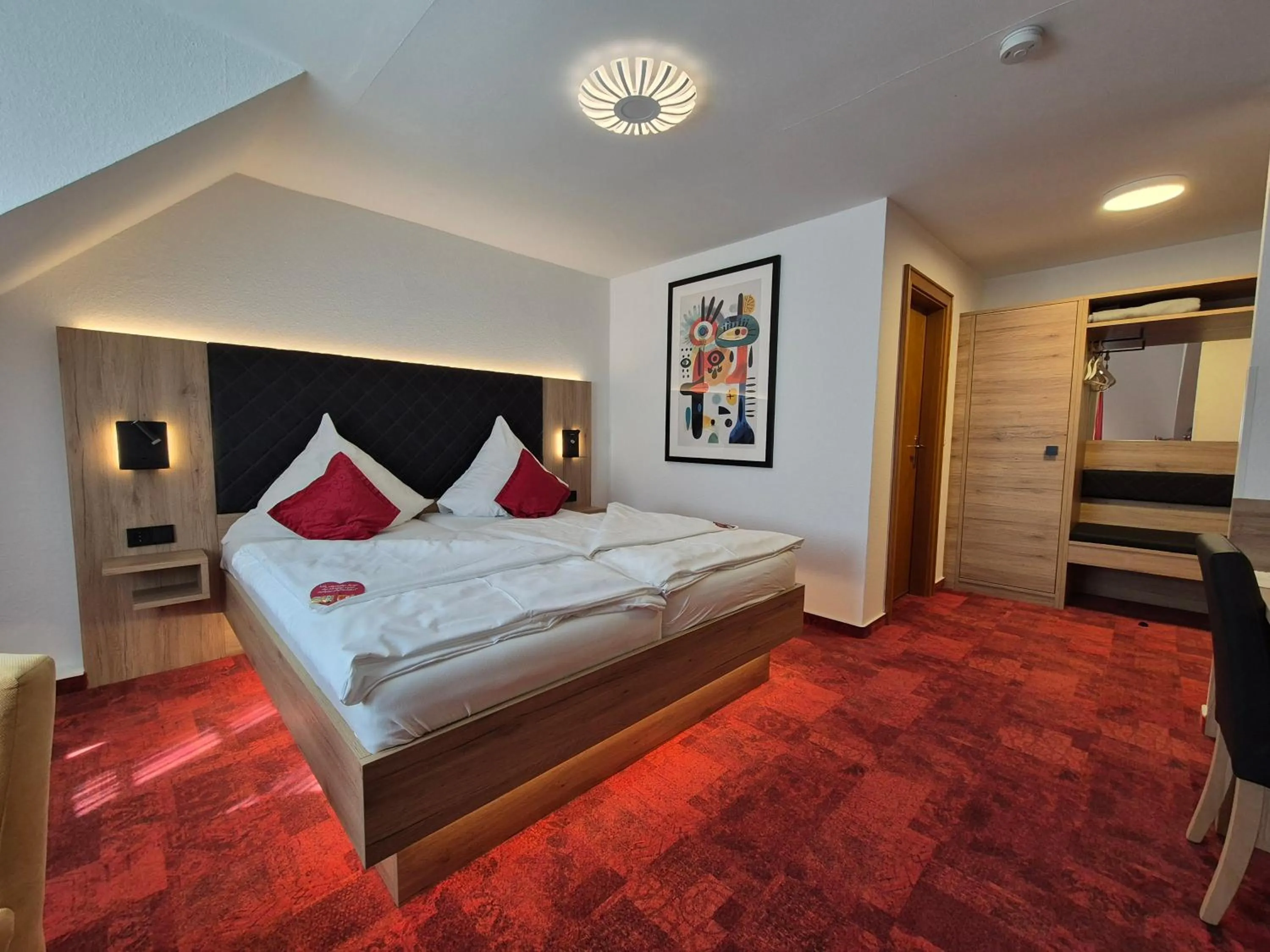 Bed in Hotel St. Georg Garni