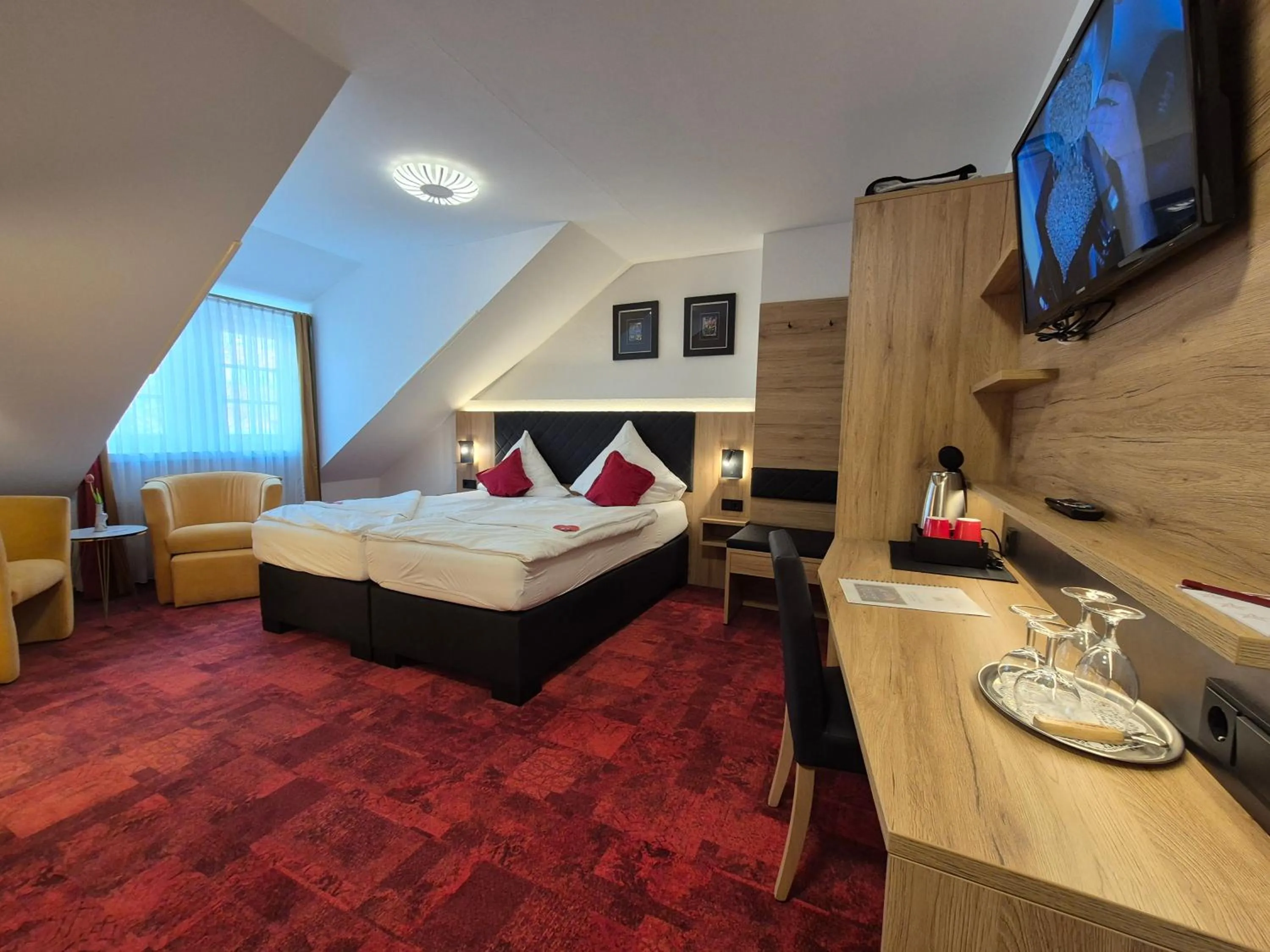 Bed in Hotel St. Georg Garni
