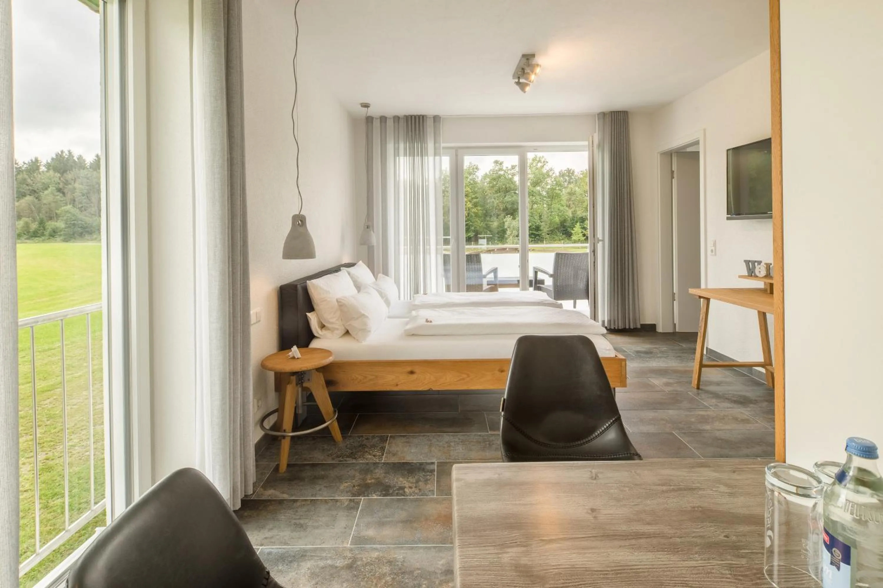 Photo of the whole room, Bed in Hotel Hofgut Tiergarten