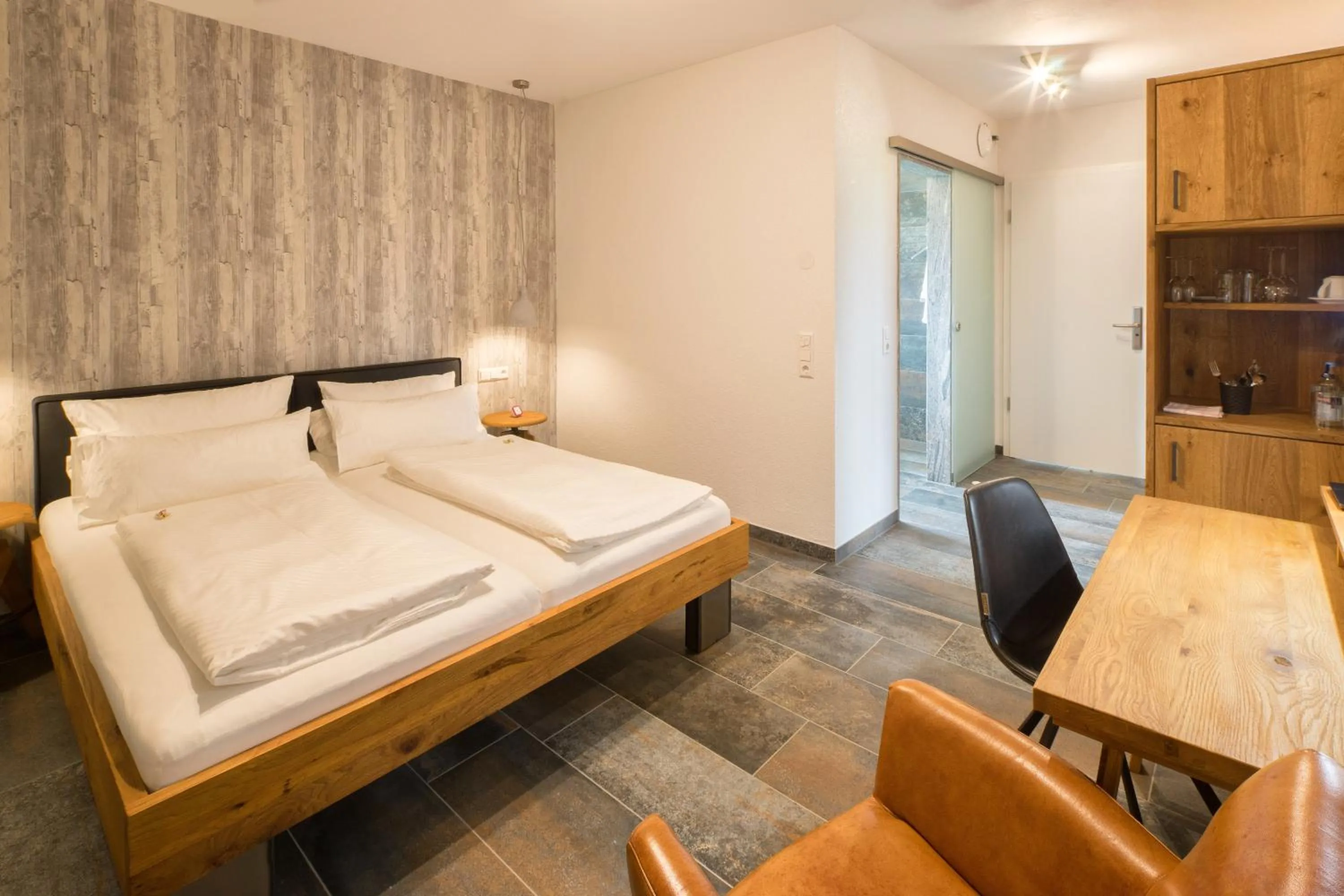 Photo of the whole room, Bed in Hotel Hofgut Tiergarten