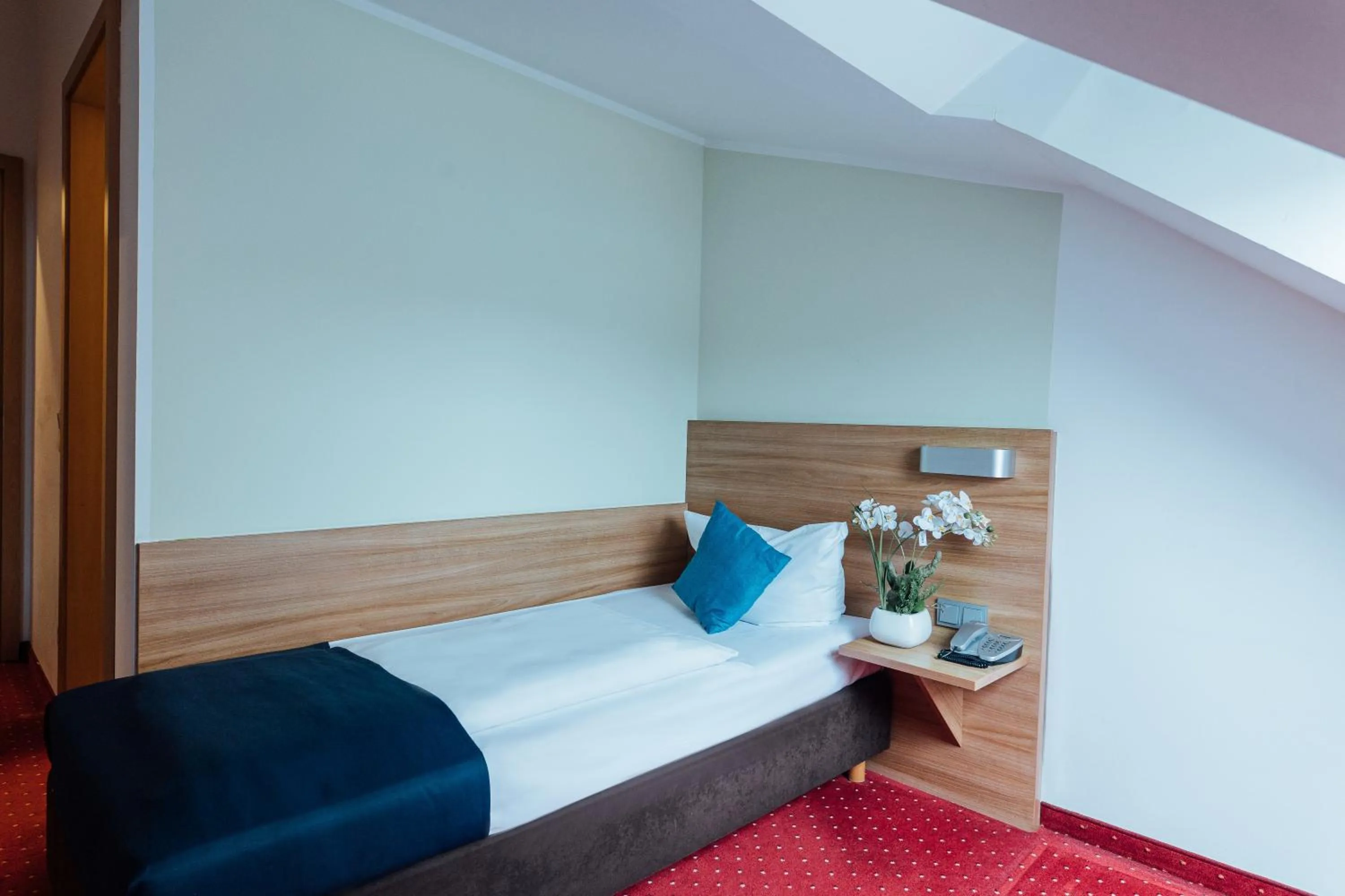 Bed in Hotel Andra München