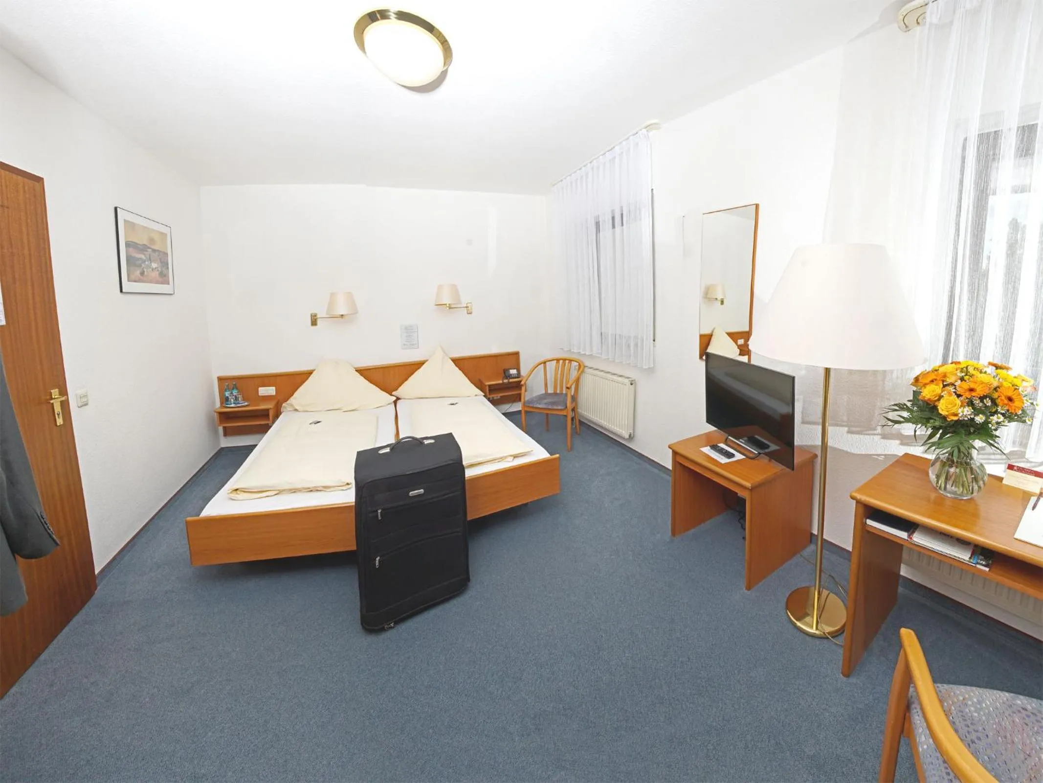 Bed in City Hotel Mark Michelstadt