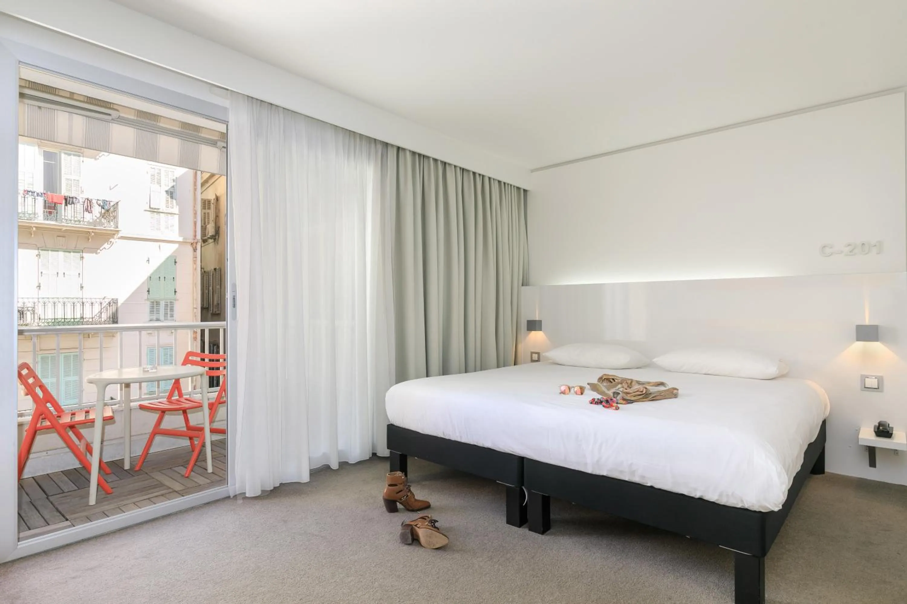 Bed in Ibis Styles Menton Centre