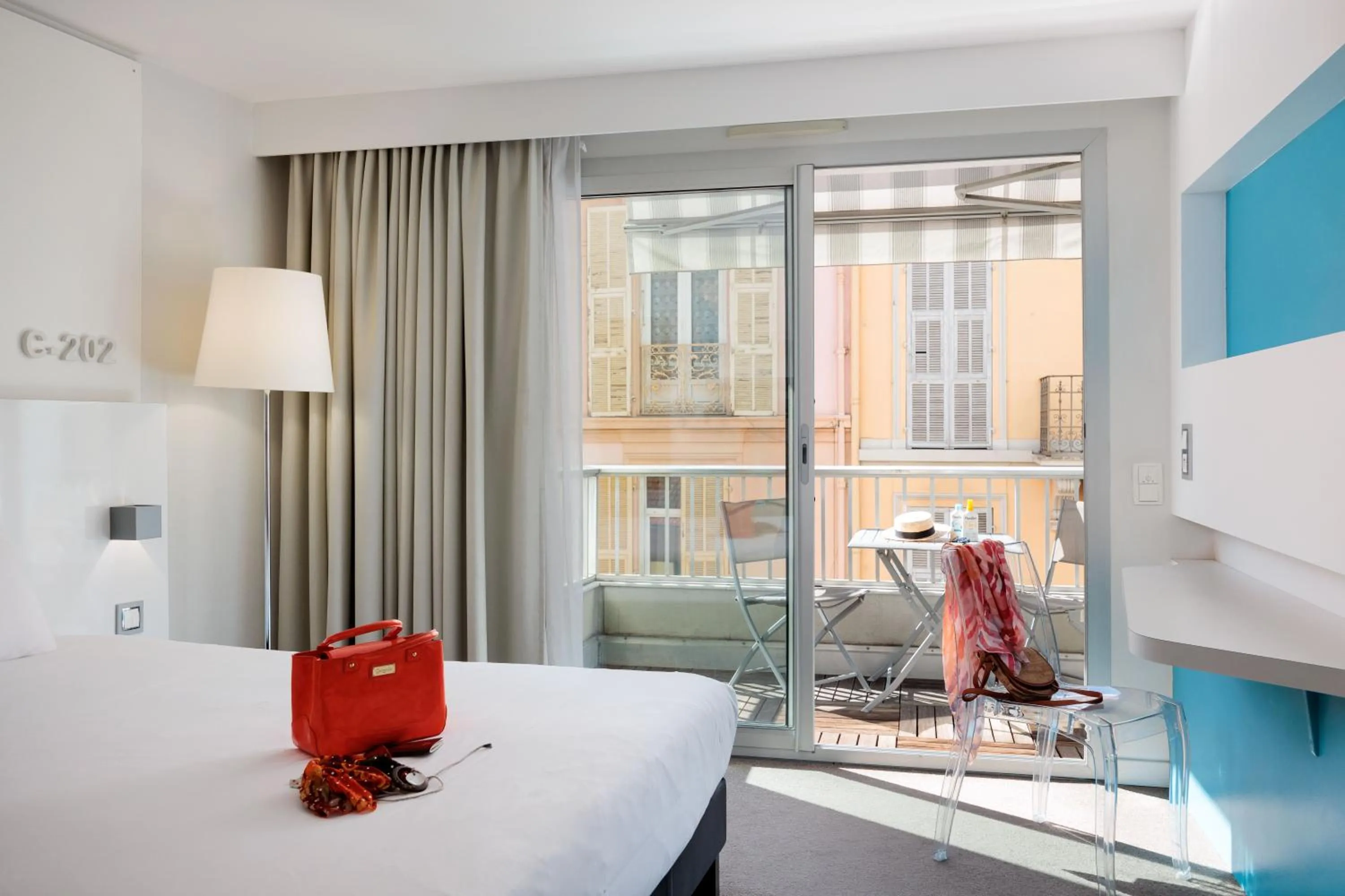 Bed in Ibis Styles Menton Centre