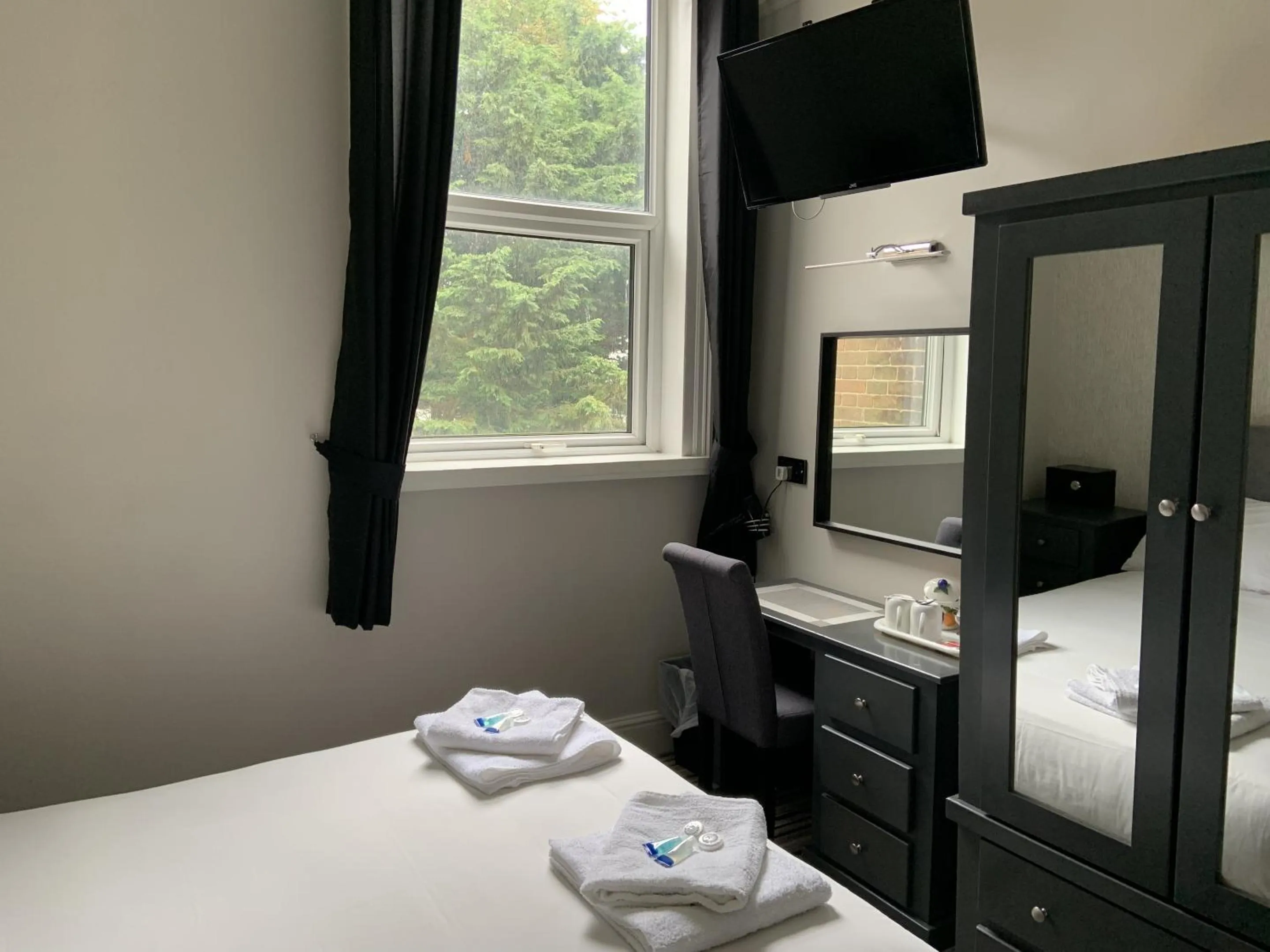 Bedroom in Arona Guest Hotel