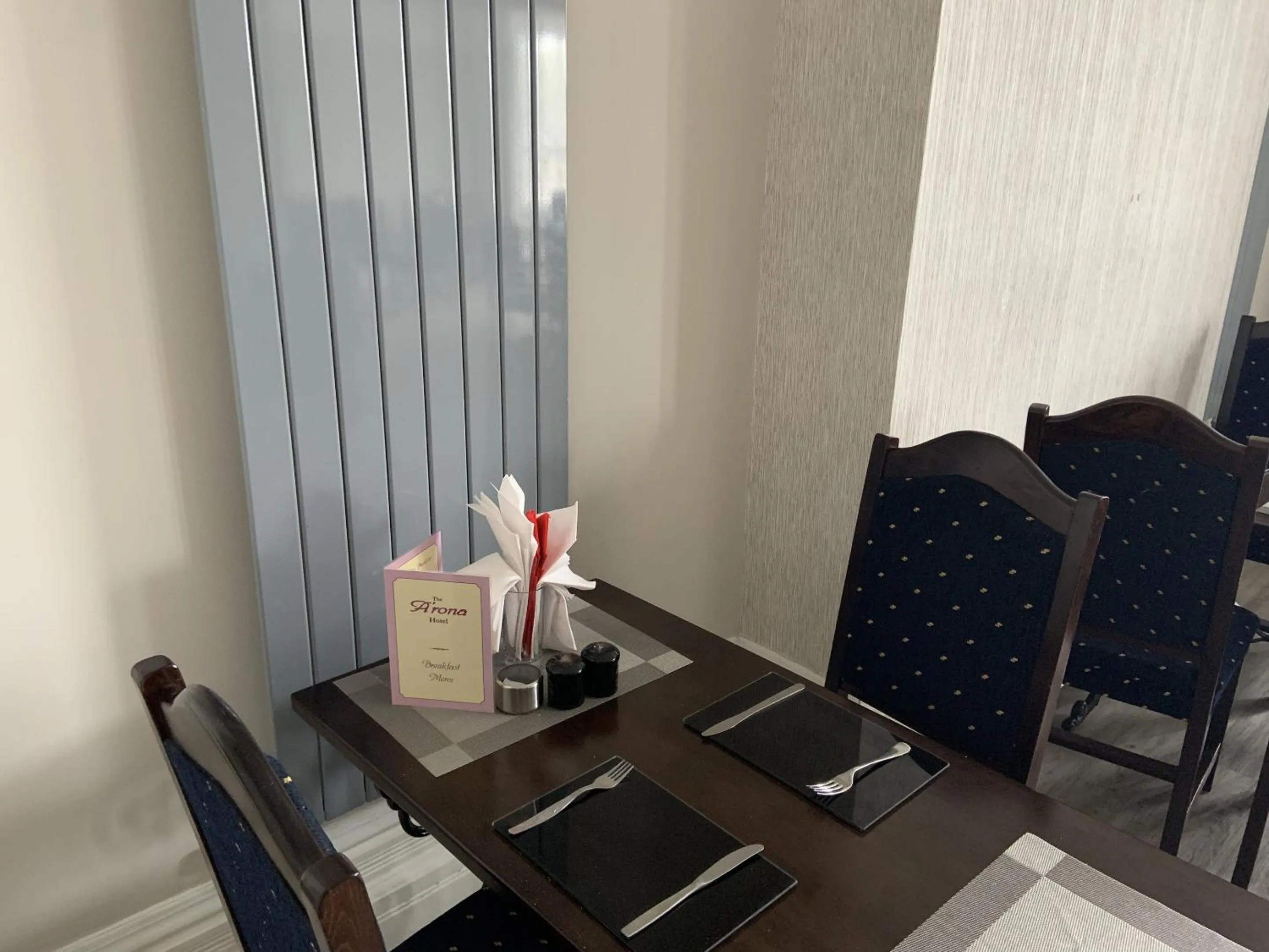 Dining area in Arona Guest Hotel