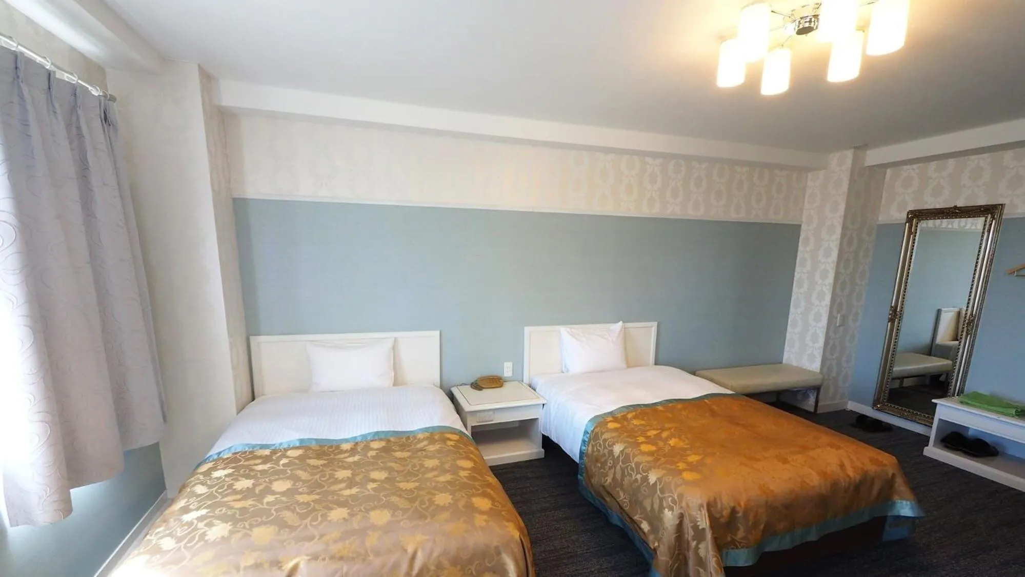 Bed in Handa Station Hotel