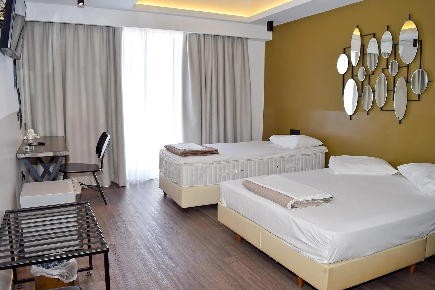 Bed in Adonis City Hotel