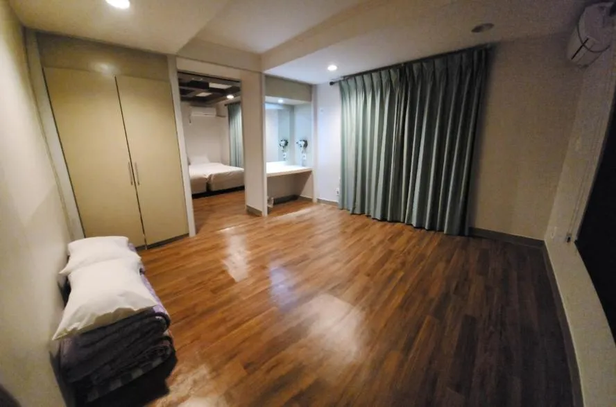 Living room, Bed in Navis Hotel