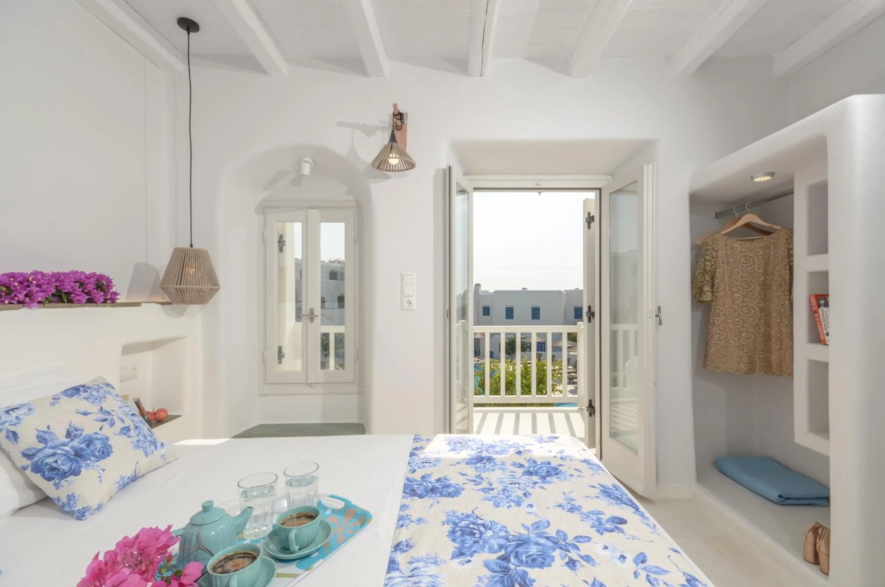 Bed in Naxian Queen Luxury Villas & Suites