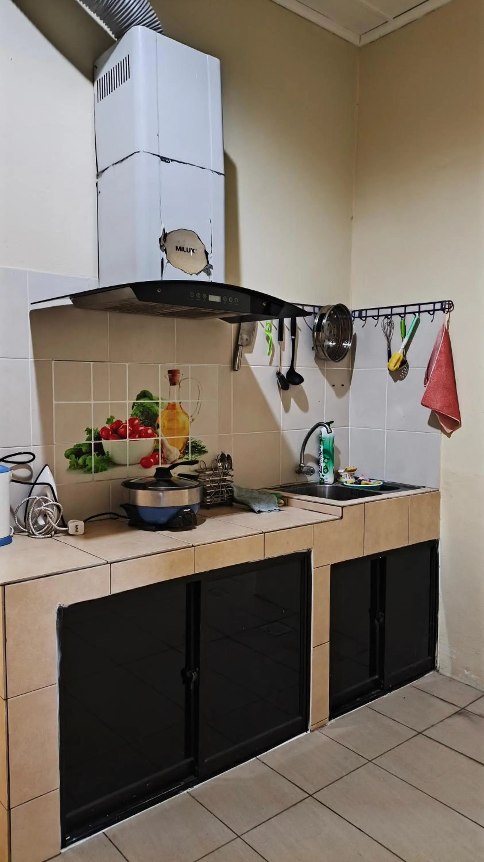 Kitchen or kitchenette in Natol Homestay - LA Tabuan Jaya